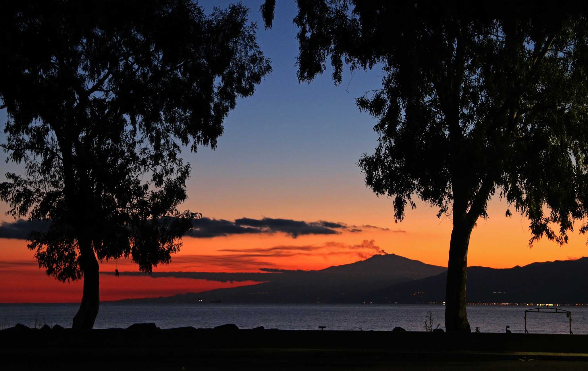 Sunset over the sea with Mount Etna volcano in Sicily, Italy HD Wallpaper