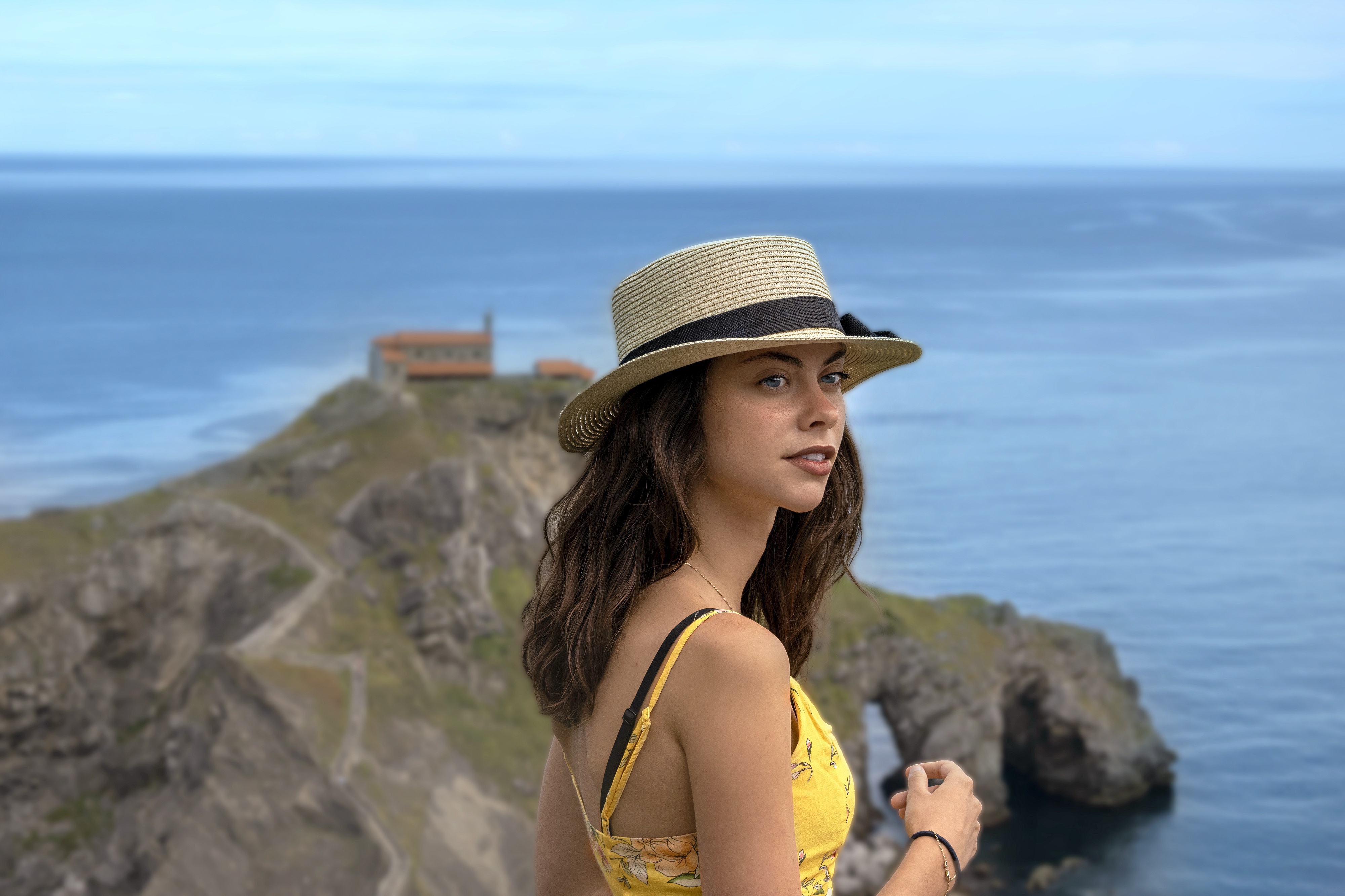 Woman with Hat on Coastline HD Wallpaper