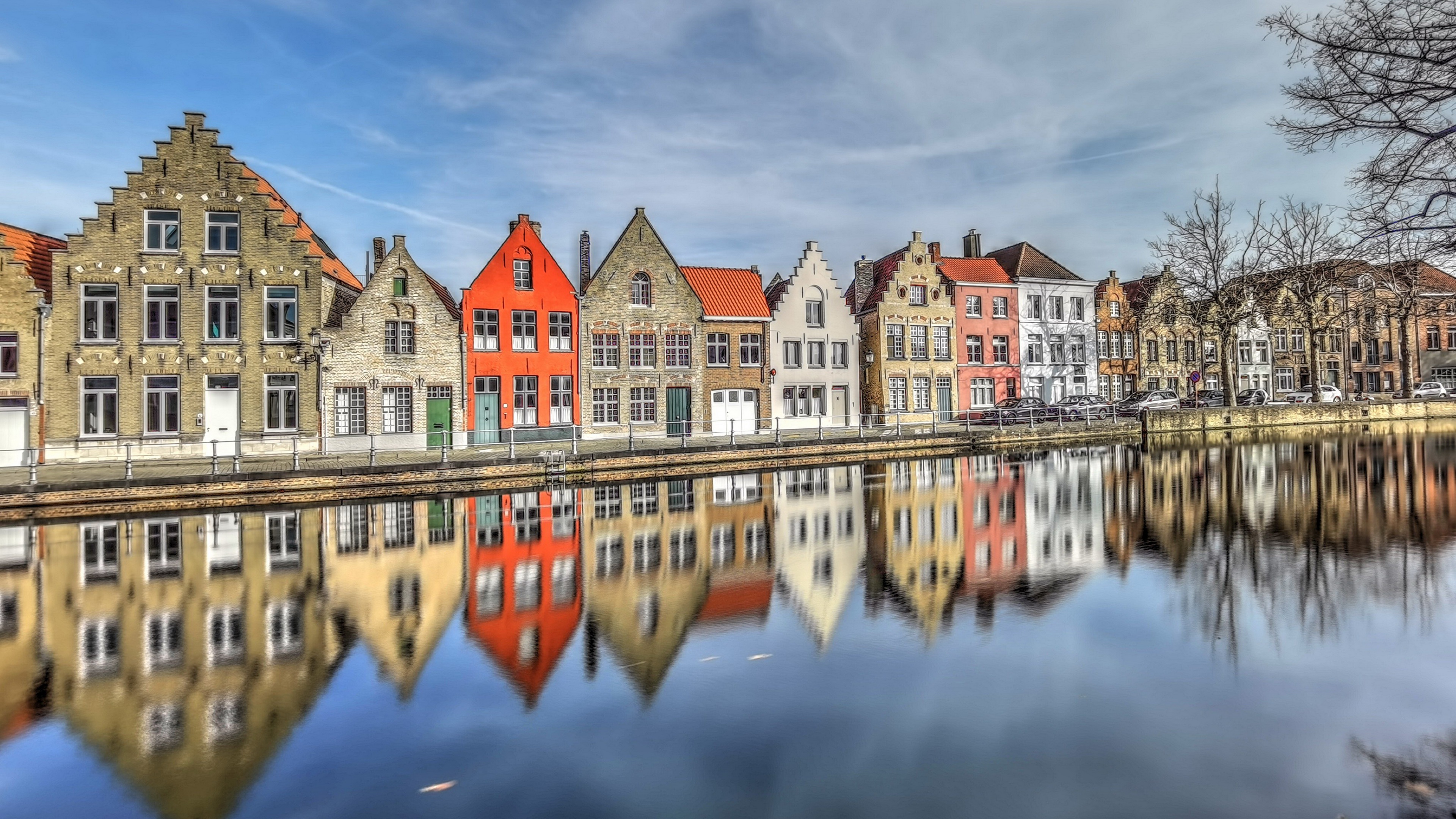 Bruges canal with colorful houses and reflections HD Wallpaper