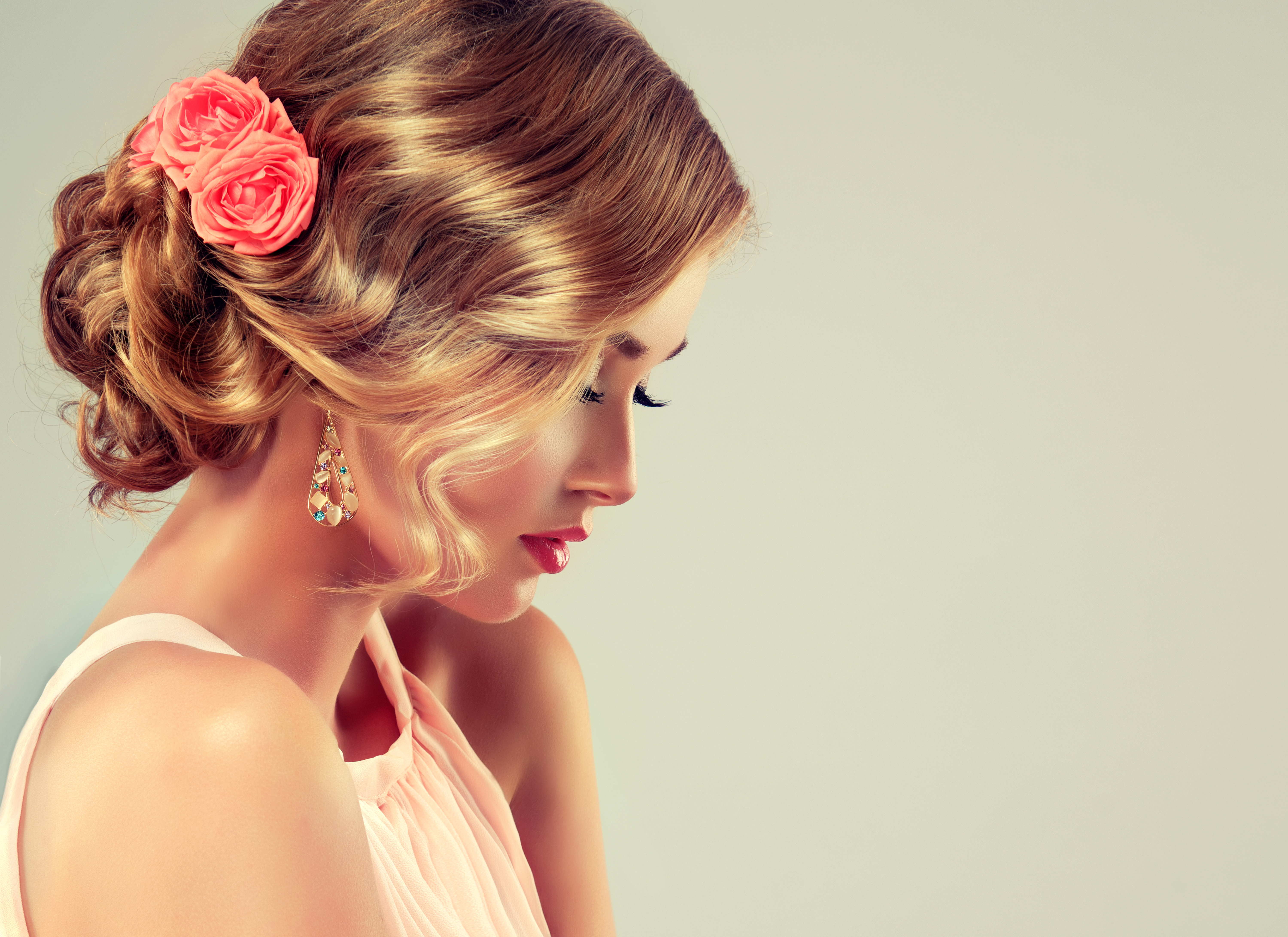 Woman with elegant updo and rose hair accessory HD Wallpaper