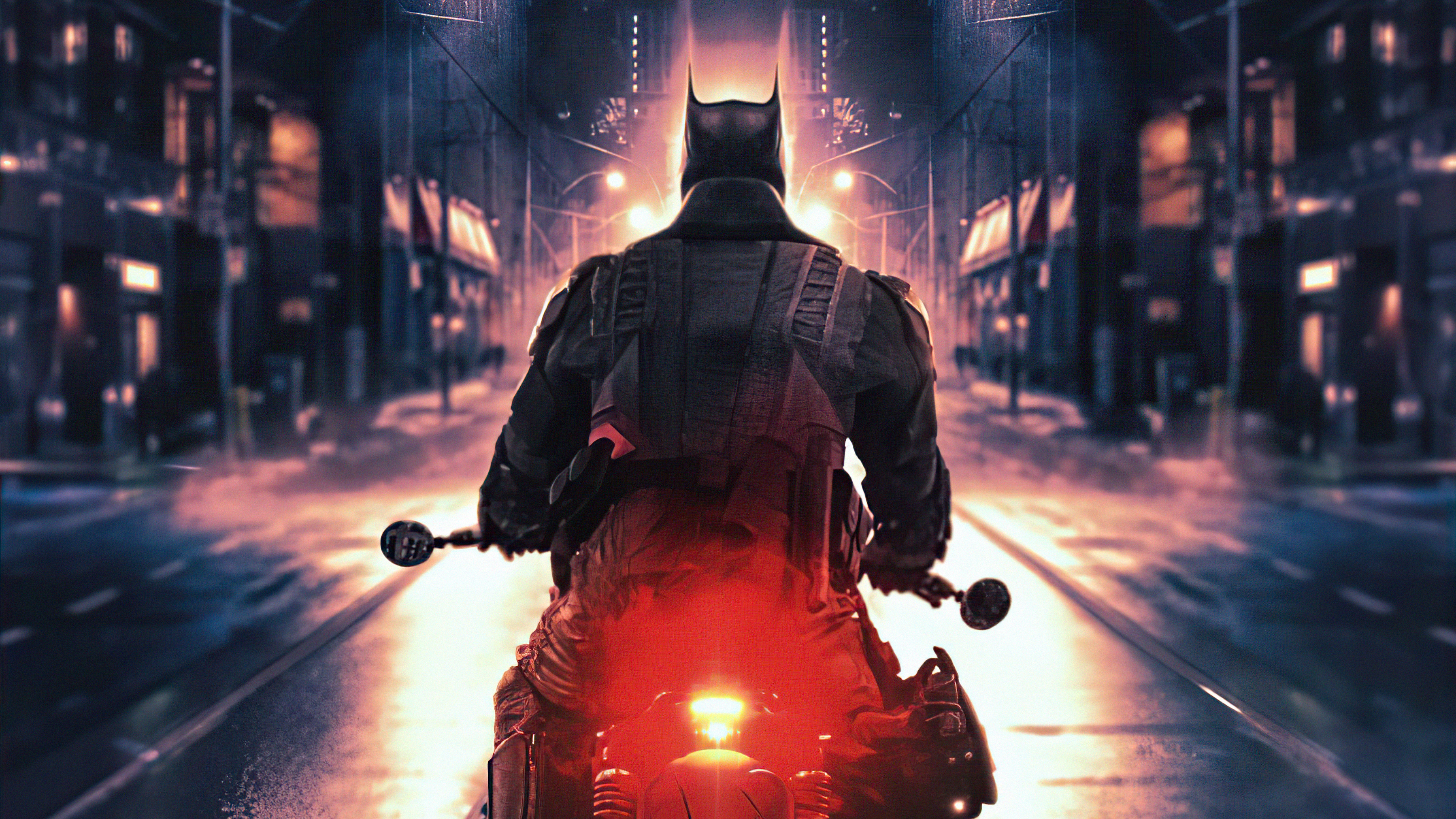 Batman on a motorcycle in a city HD Wallpaper