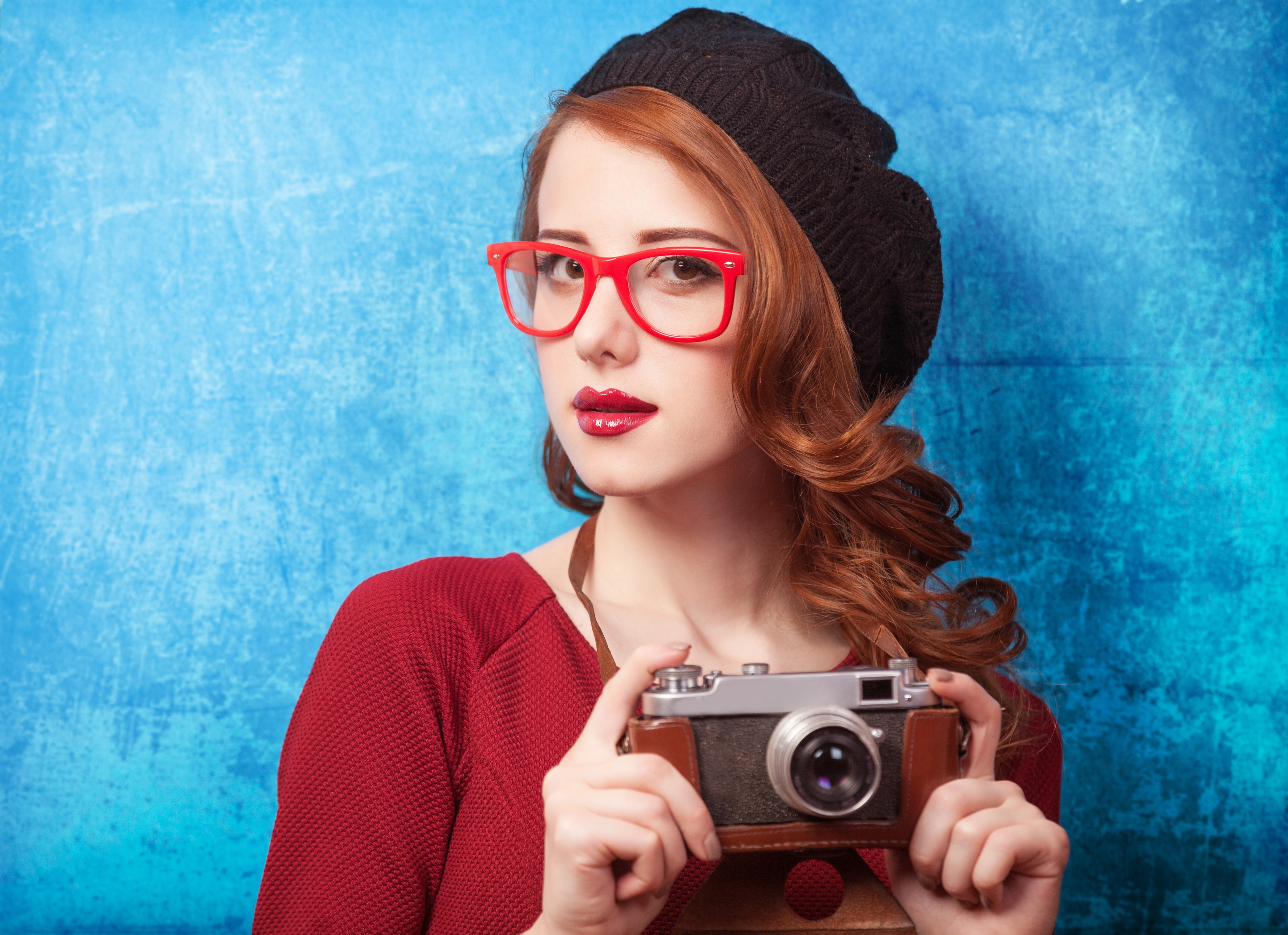 Redhead Woman with Vintage Camera and Glasses HD Wallpaper