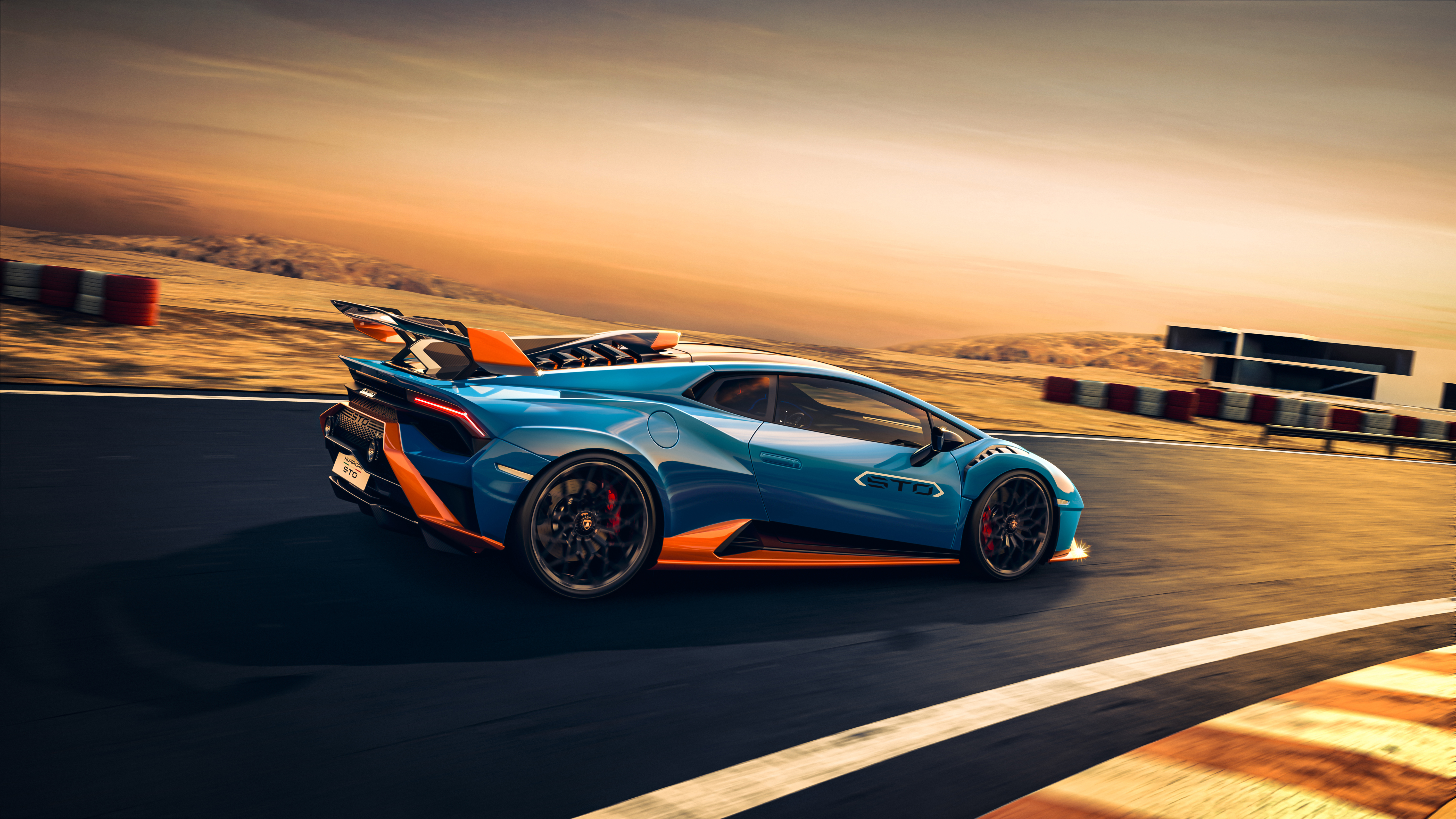 Blue Lamborghini Huracán STO 4K on a Racetrack HD Wallpaper