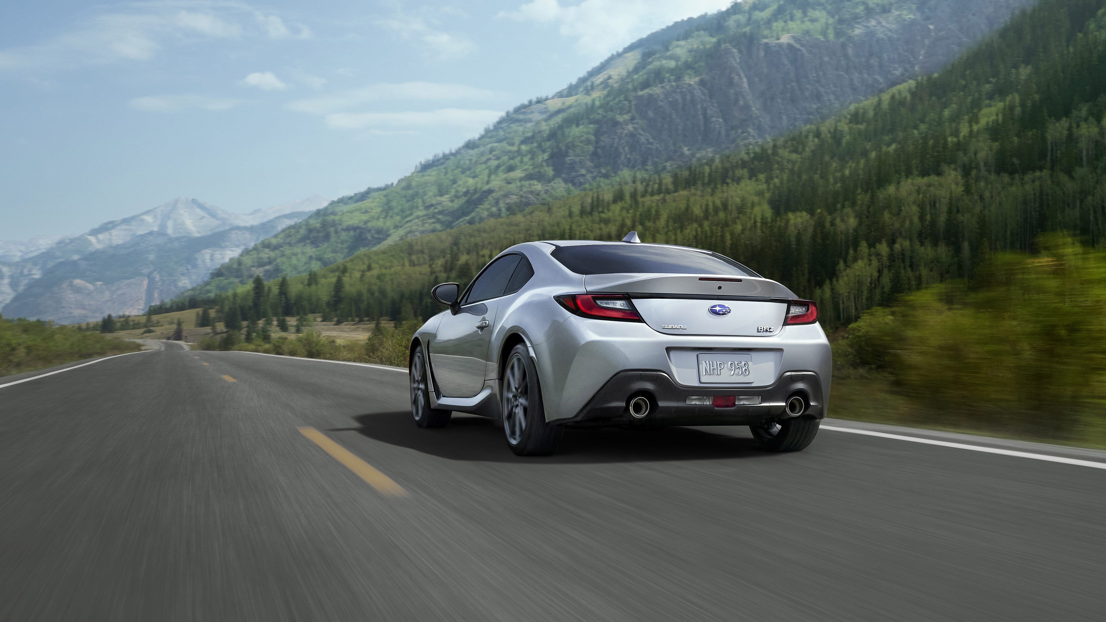 Silver Subaru BRZ driving on a mountain road HD Wallpaper