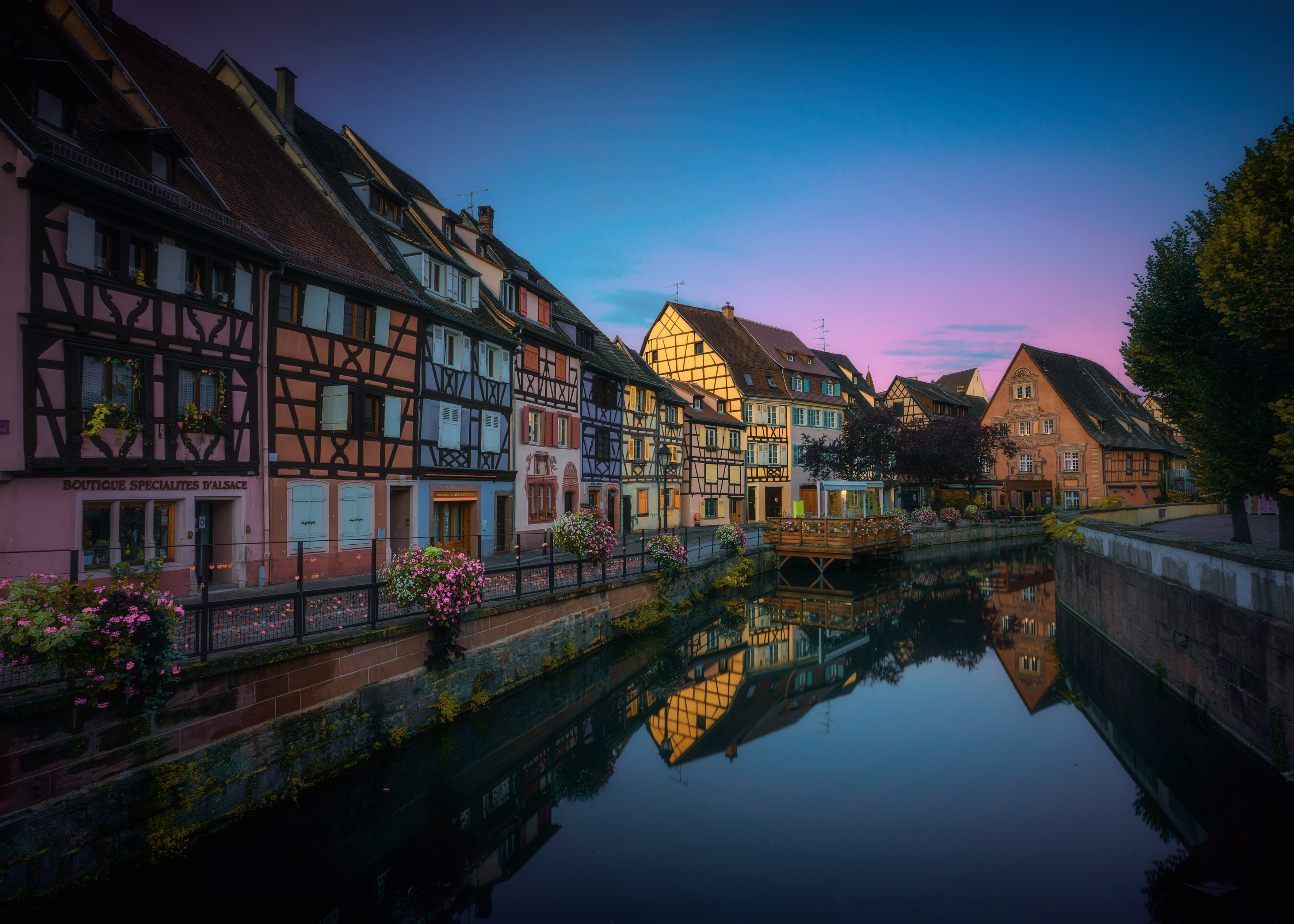 Half-timbered houses along a canal in Colmar, France HD Wallpaper