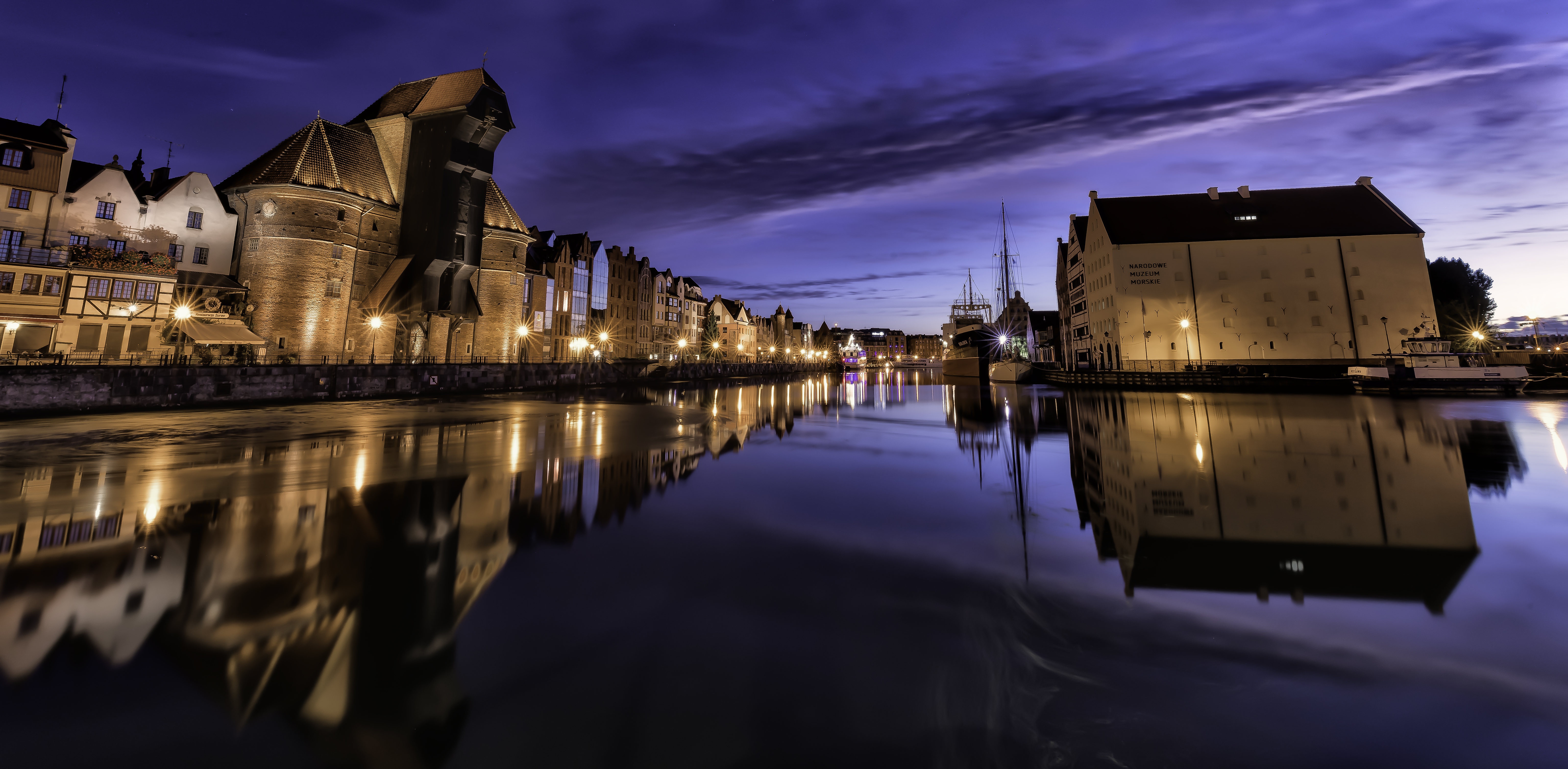 Gdansk waterfront at twilight with reflections HD Wallpaper