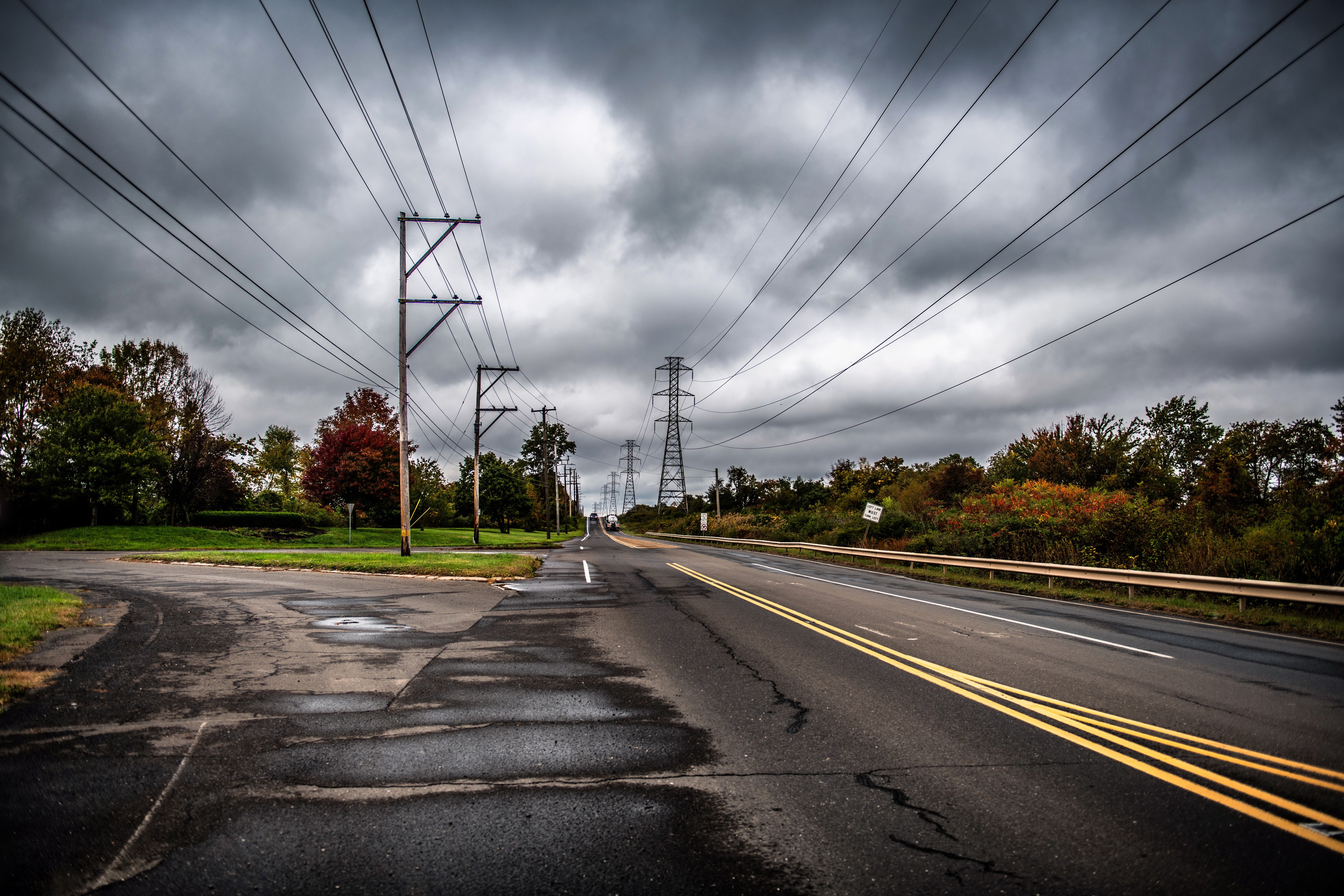 Road with power lines and autumn trees HD Wallpaper