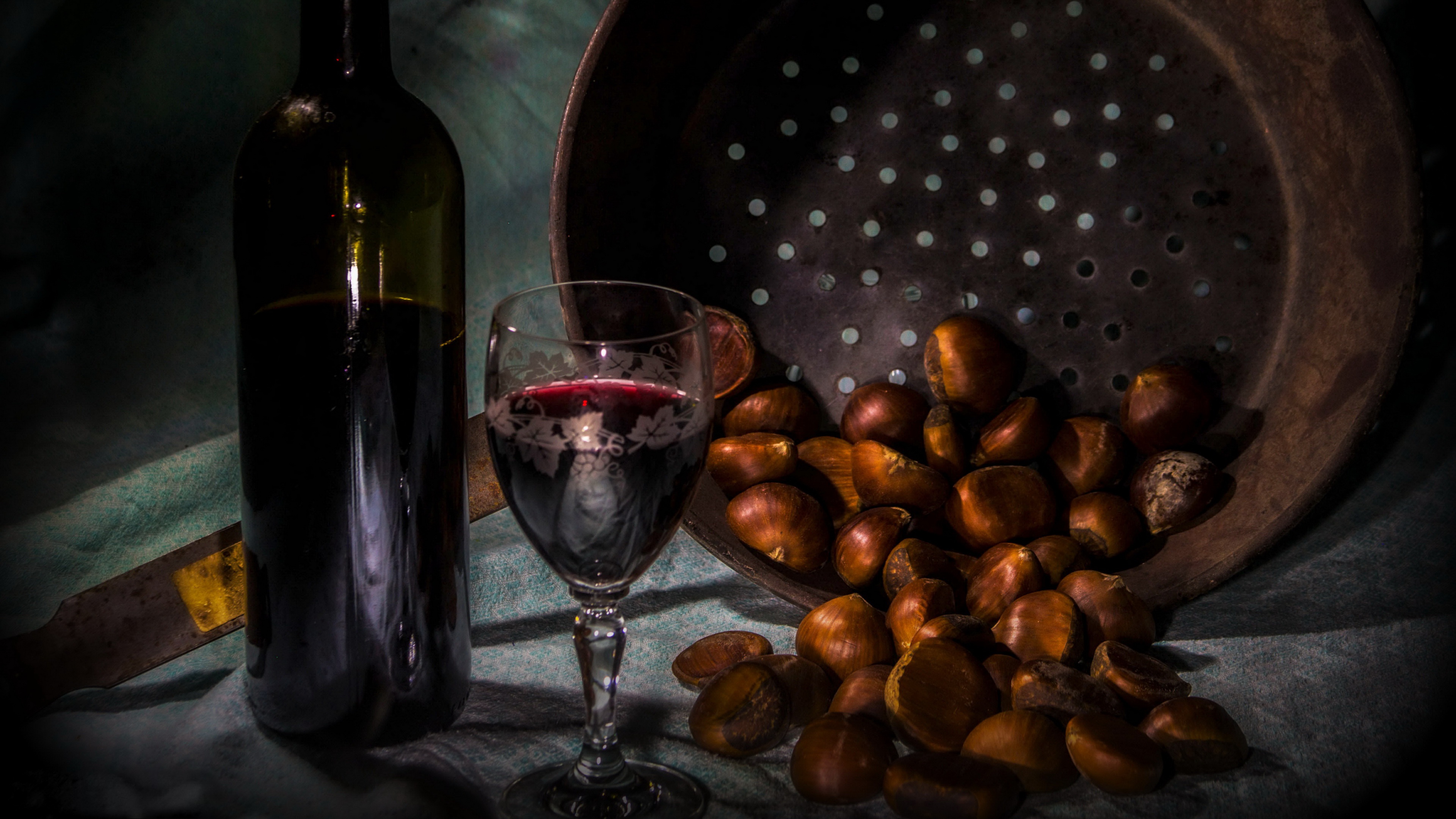 Bottle of red wine and chestnuts HD Wallpaper