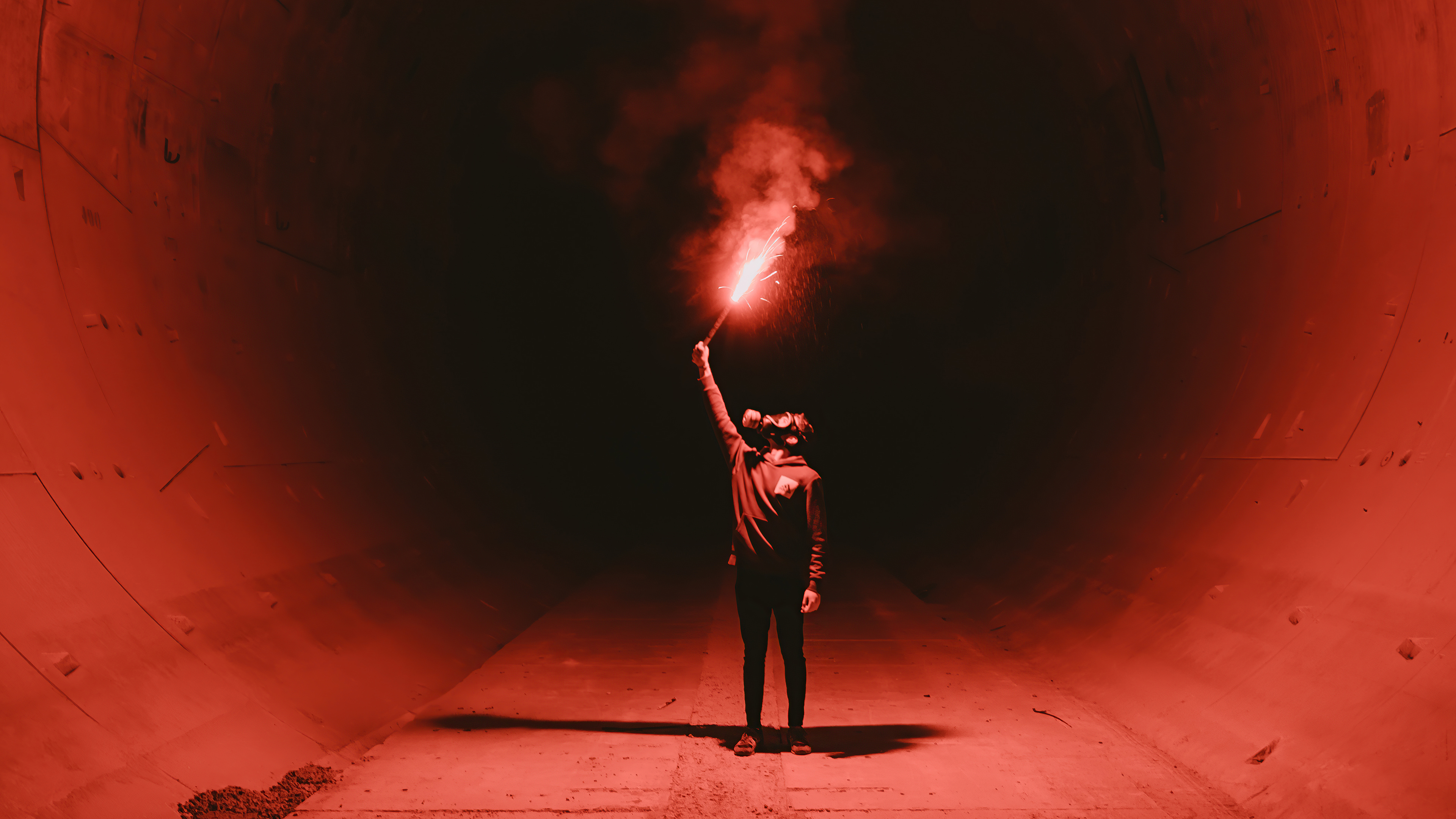 Person with flare in tunnel HD Wallpaper