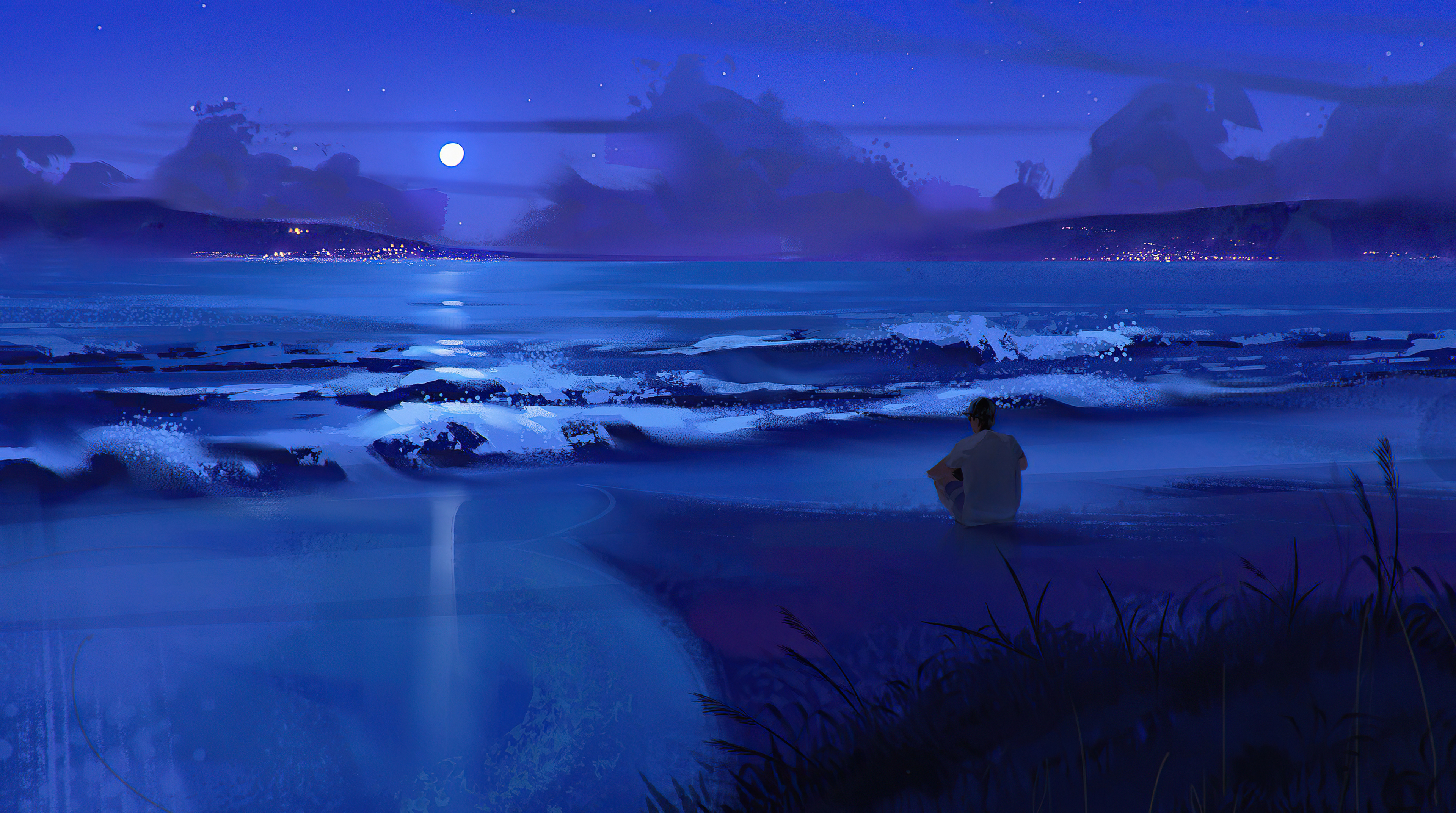 Person sitting on a beach at night HD Wallpaper