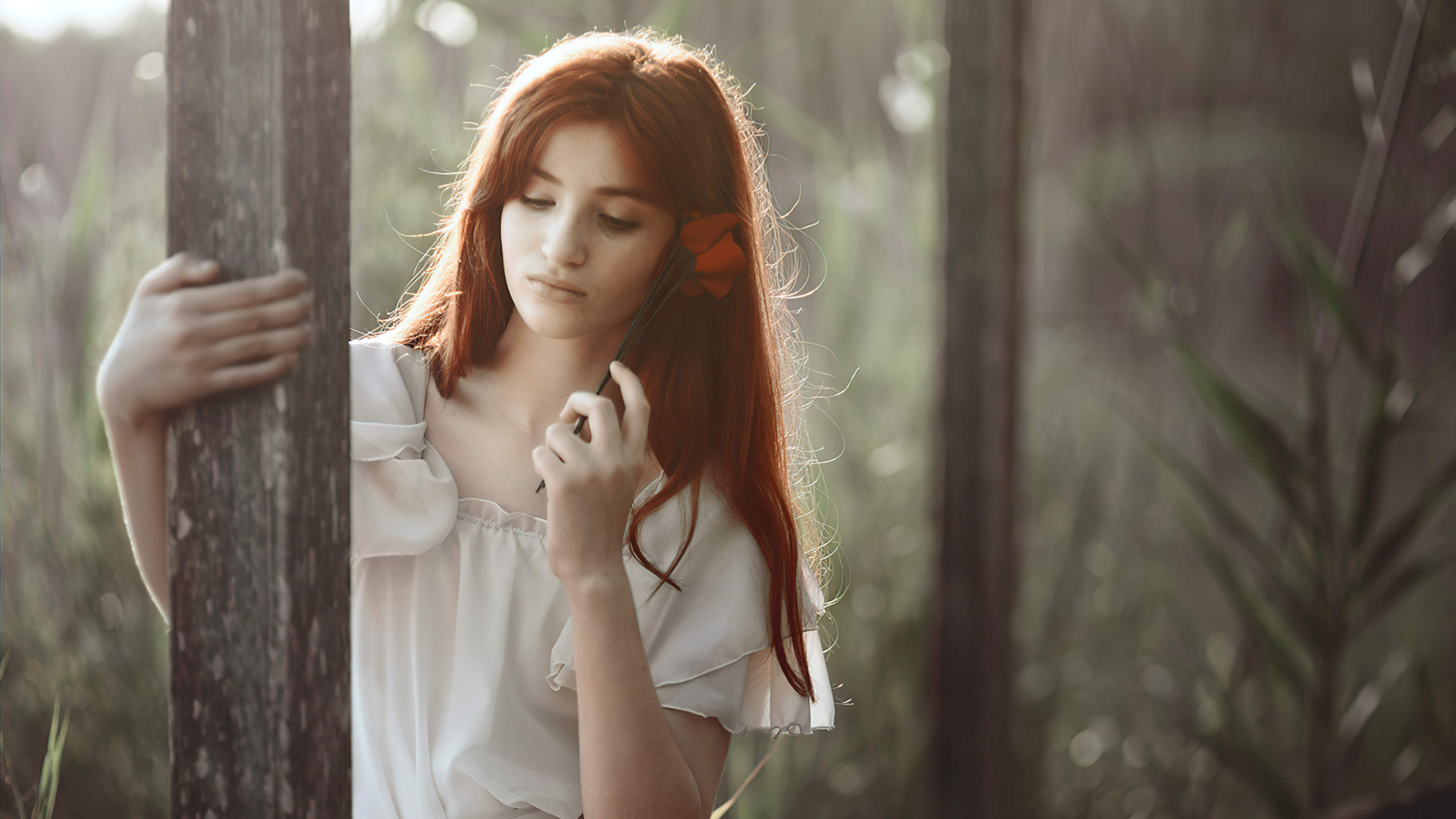 Girl with red hair holding a rose HD Wallpaper