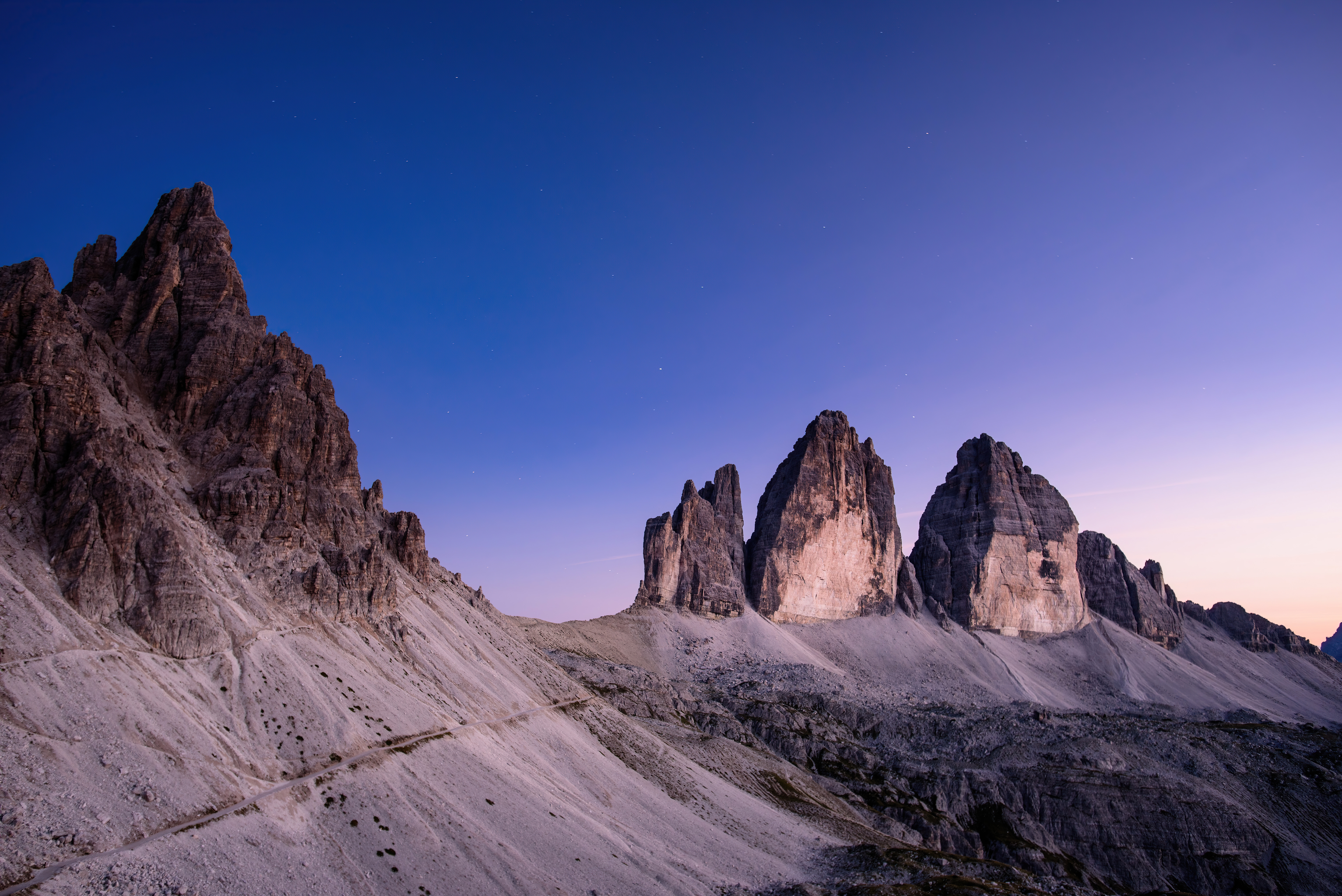 Majestic Mountain Peaks Under Evening Sky HD Wallpaper