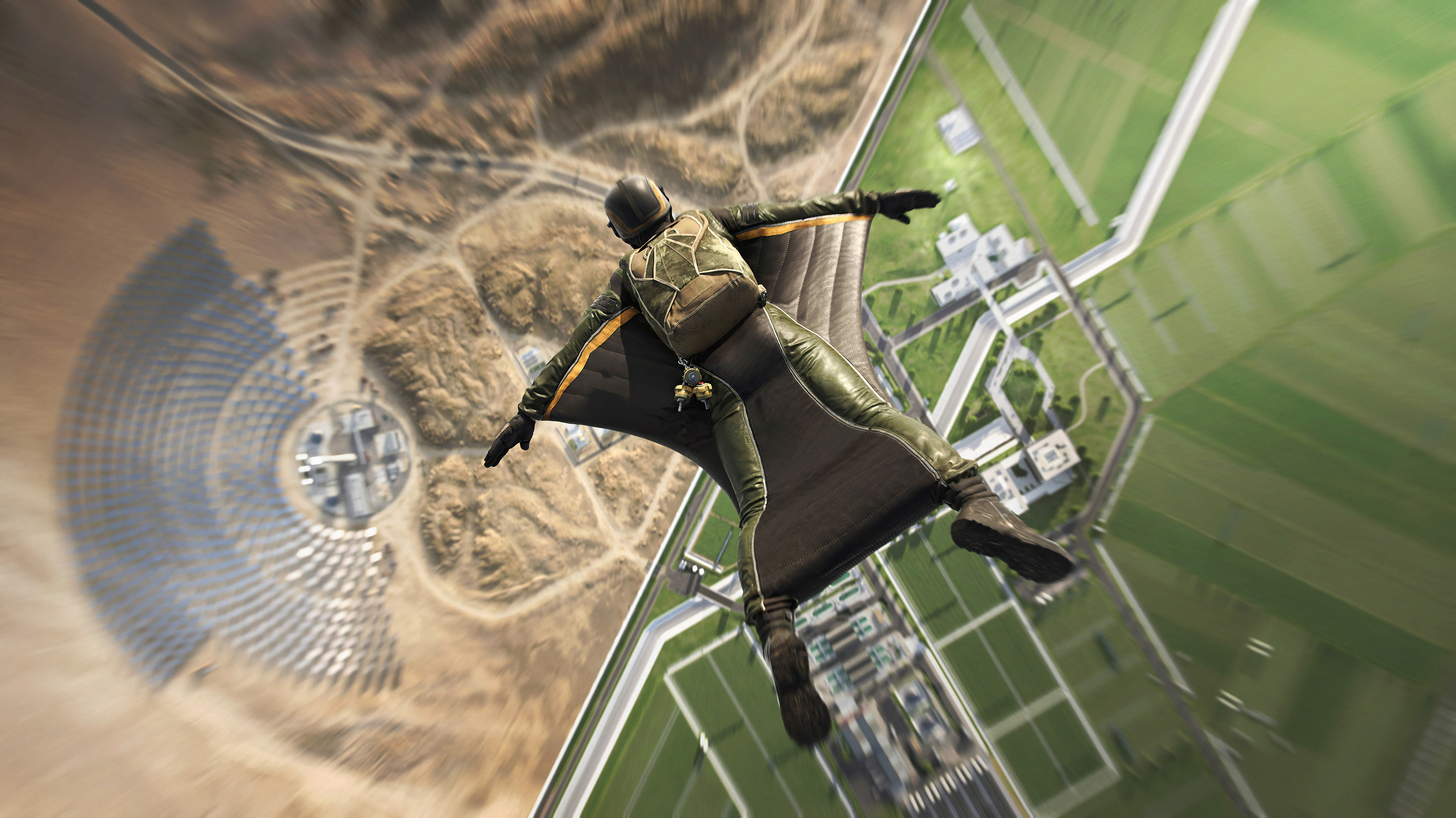 Player in wingsuit over Battlefield 2042 landscape HD Wallpaper