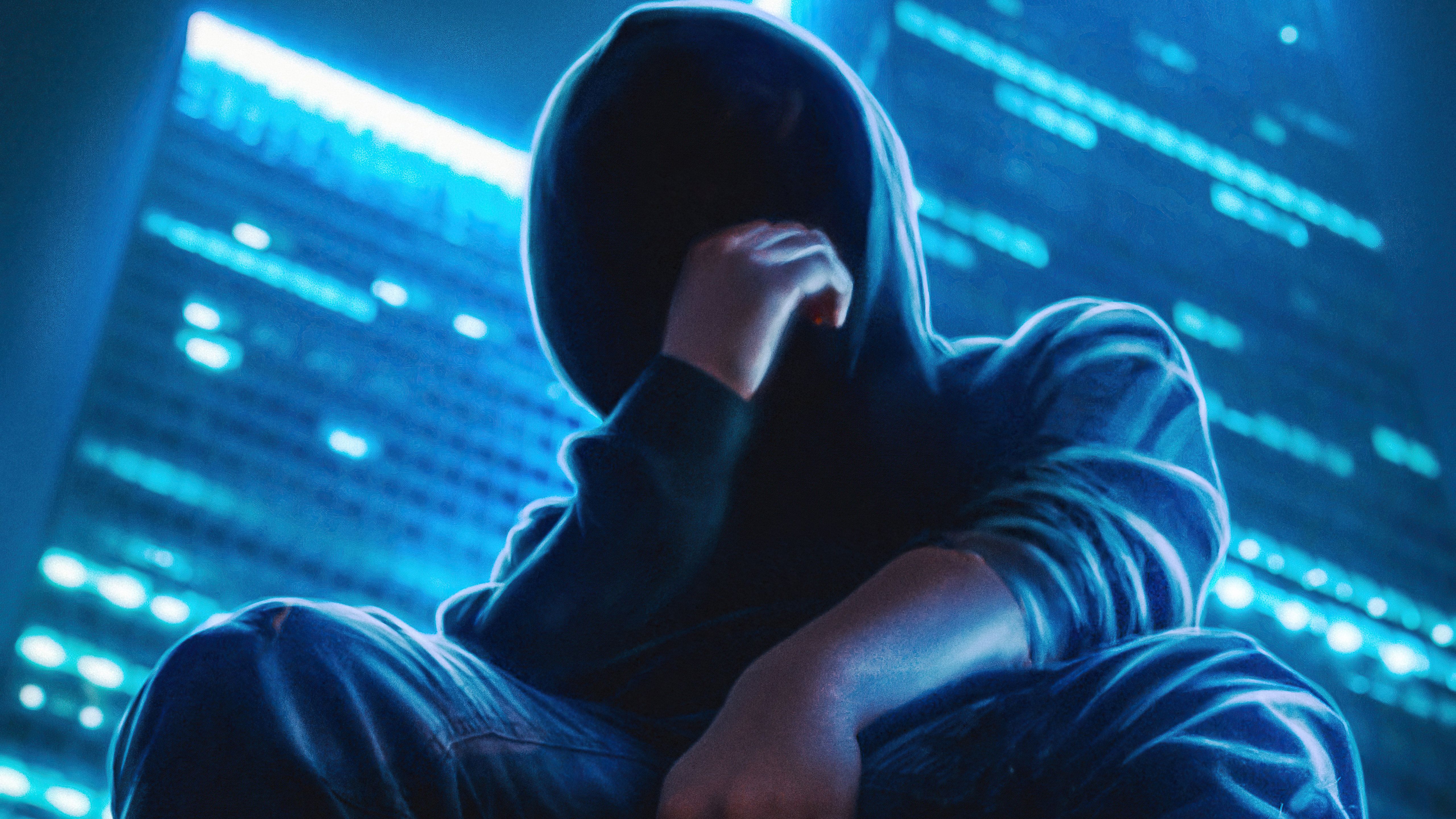 Anonymous person in a hoodie in front of a blue cityscape HD Wallpaper