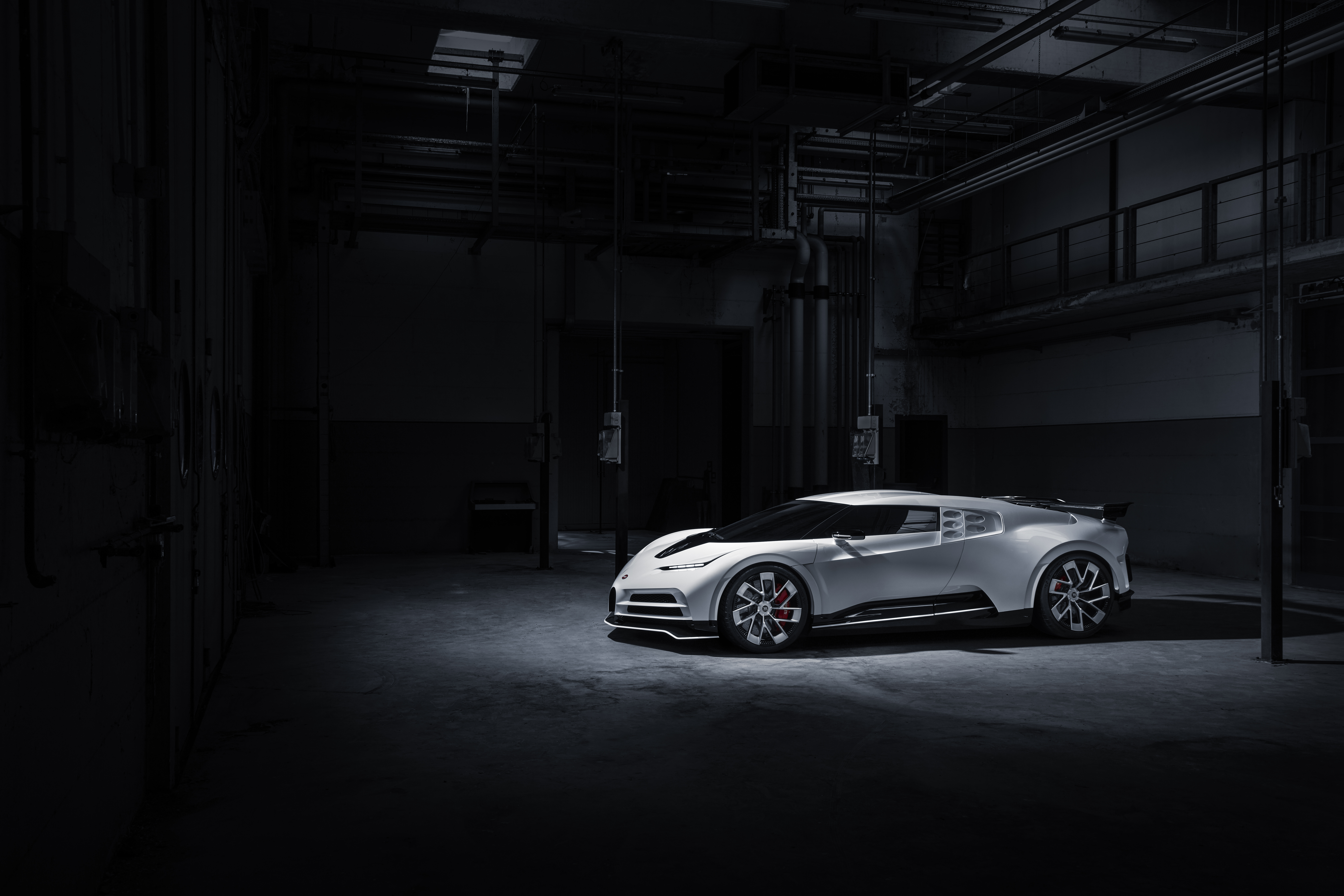 Bugatti Centodieci in a dark industrial setting HD Wallpaper