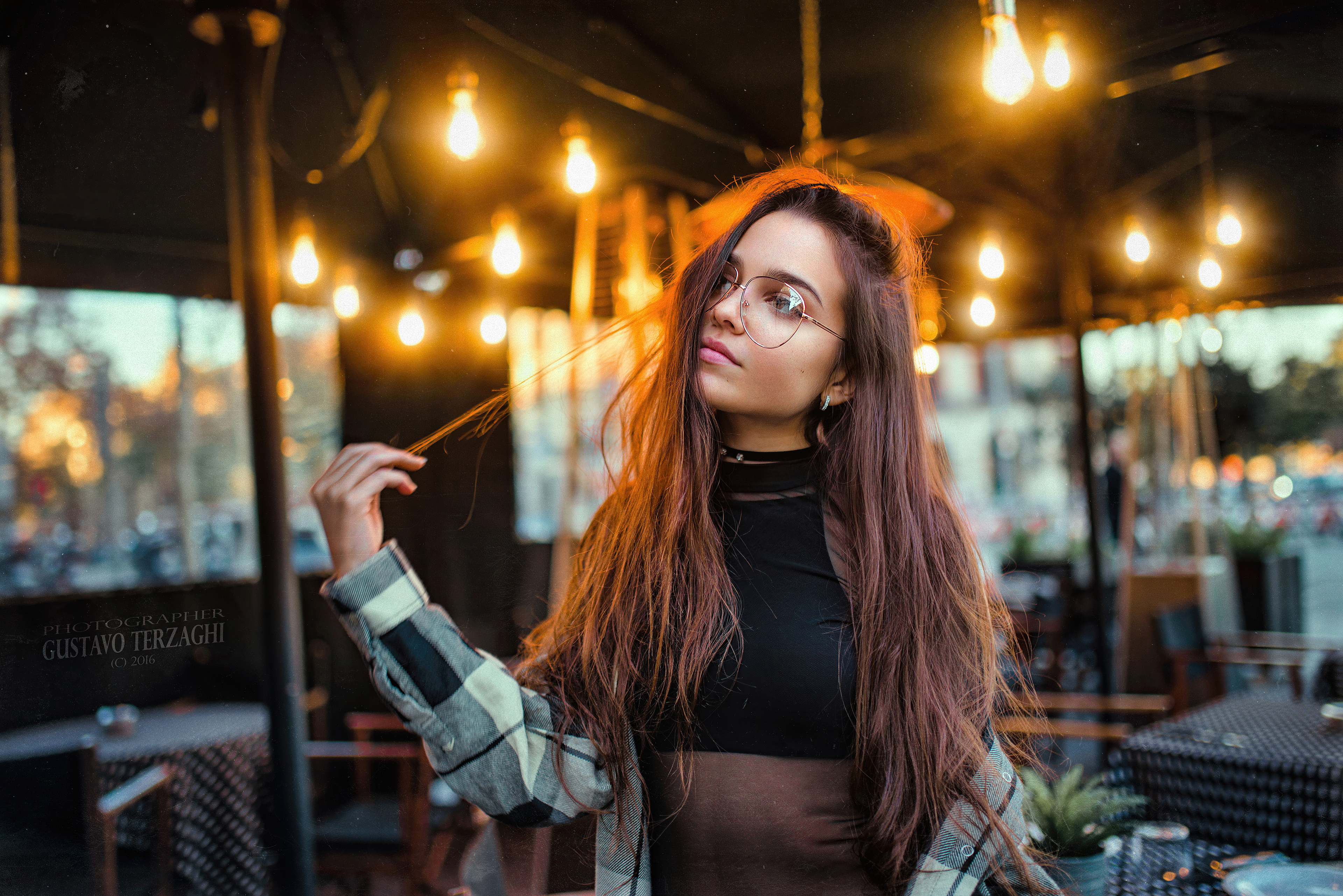 Girl with long hair and glasses at an outdoor cafe HD Wallpaper