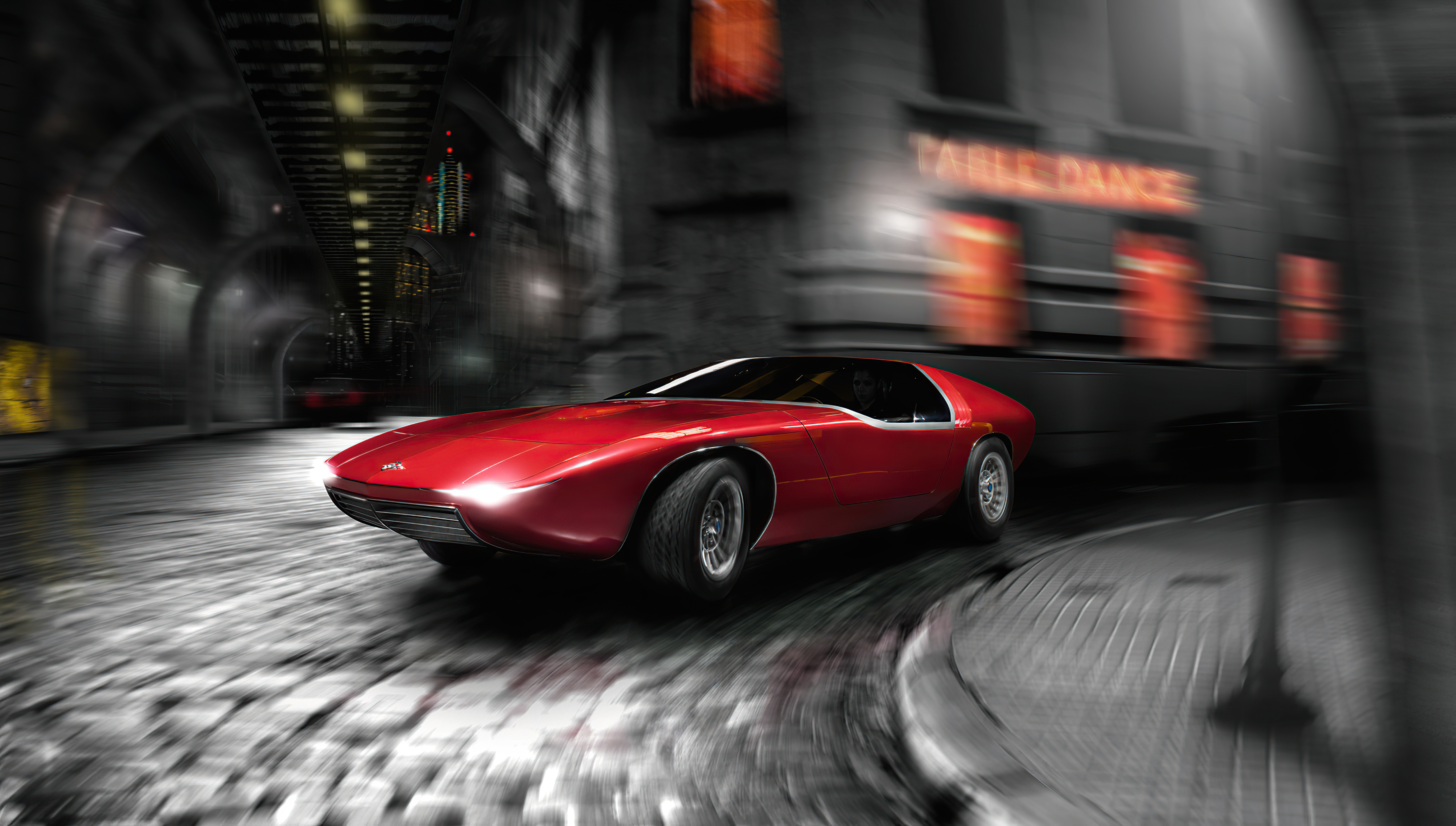 Red concept car driving through a city at night HD Wallpaper