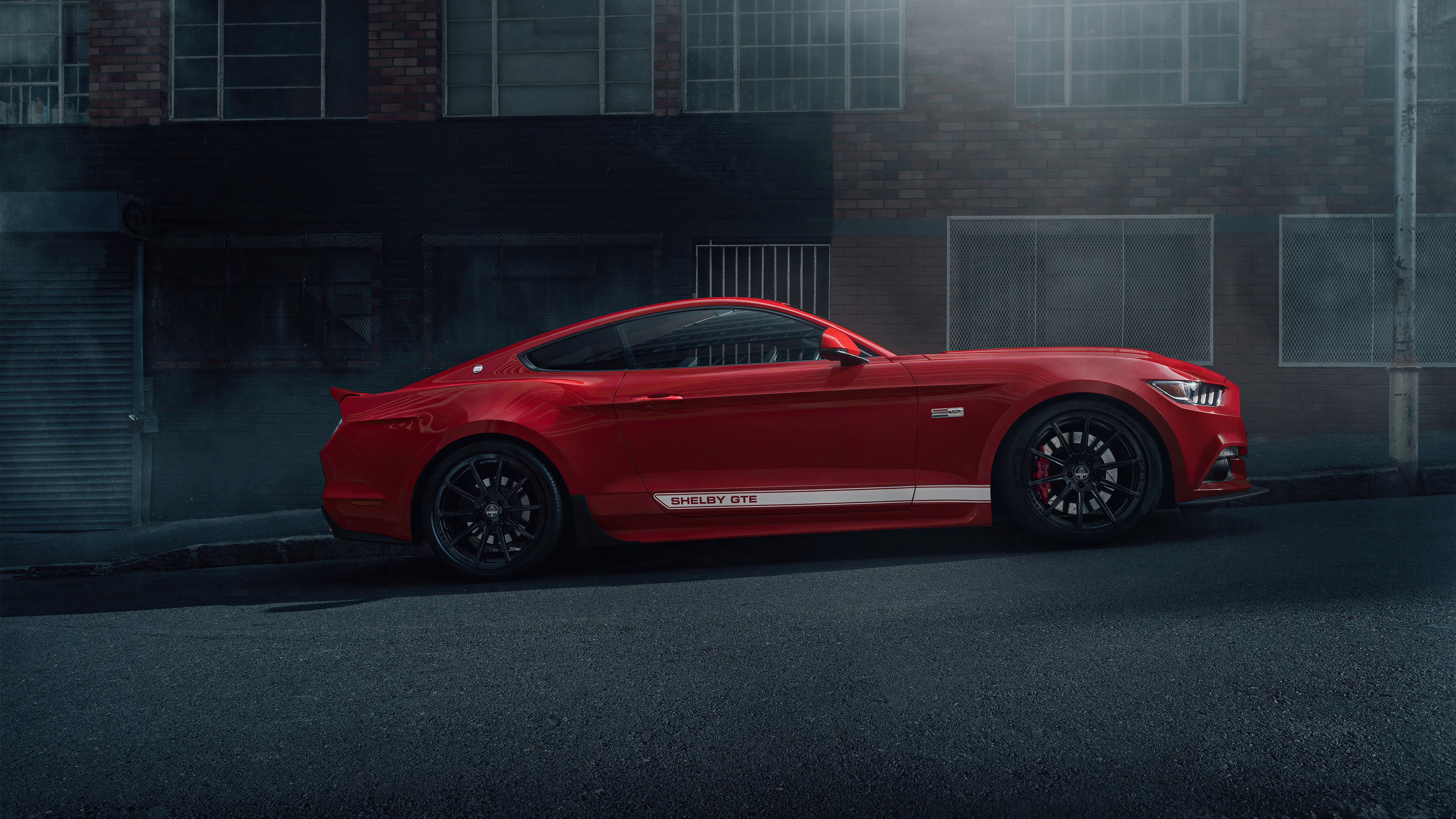Red Ford Mustang Shelby GT500 parked on street HD Wallpaper