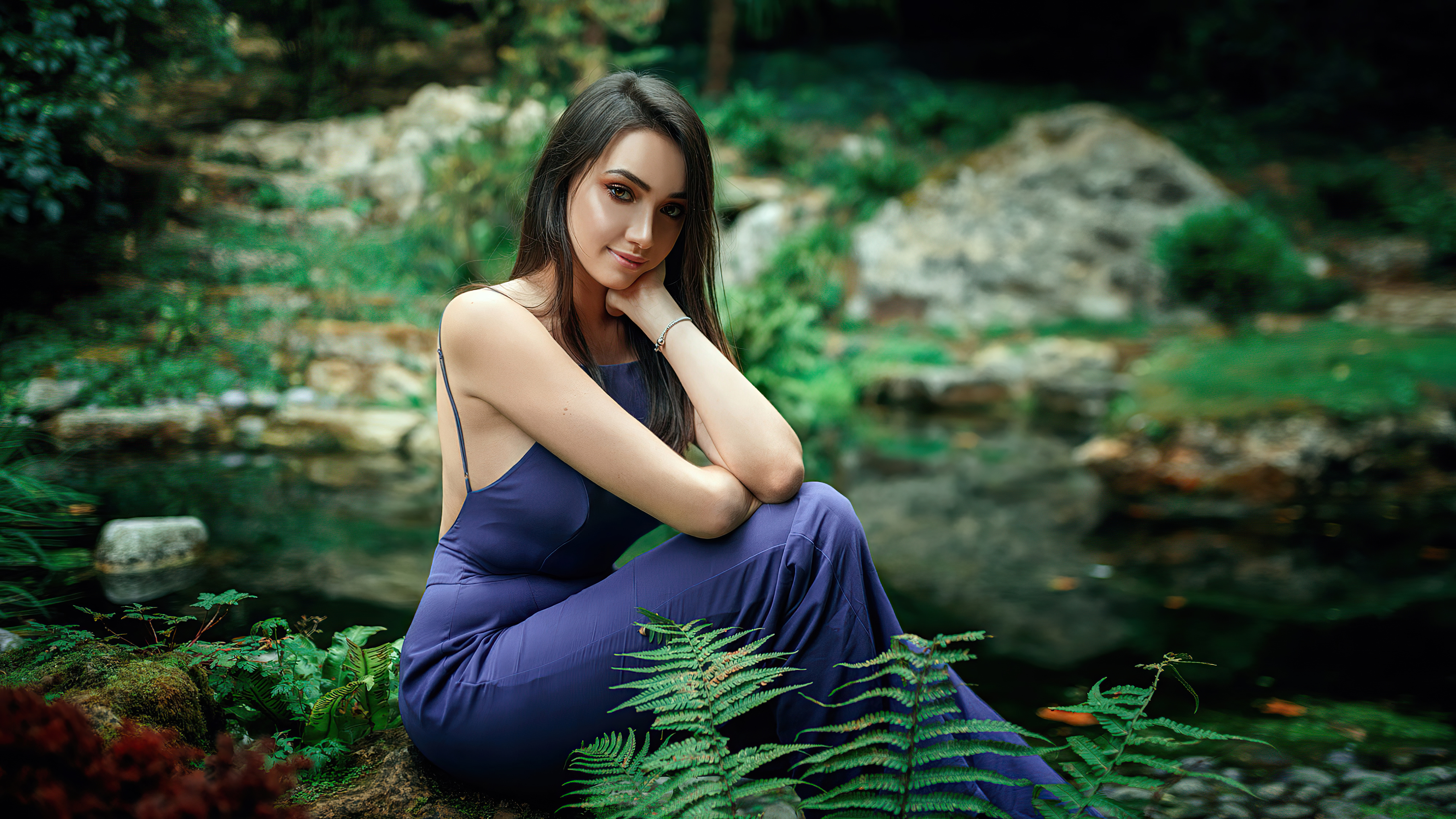 Woman in a blue dress posing outdoors HD Wallpaper