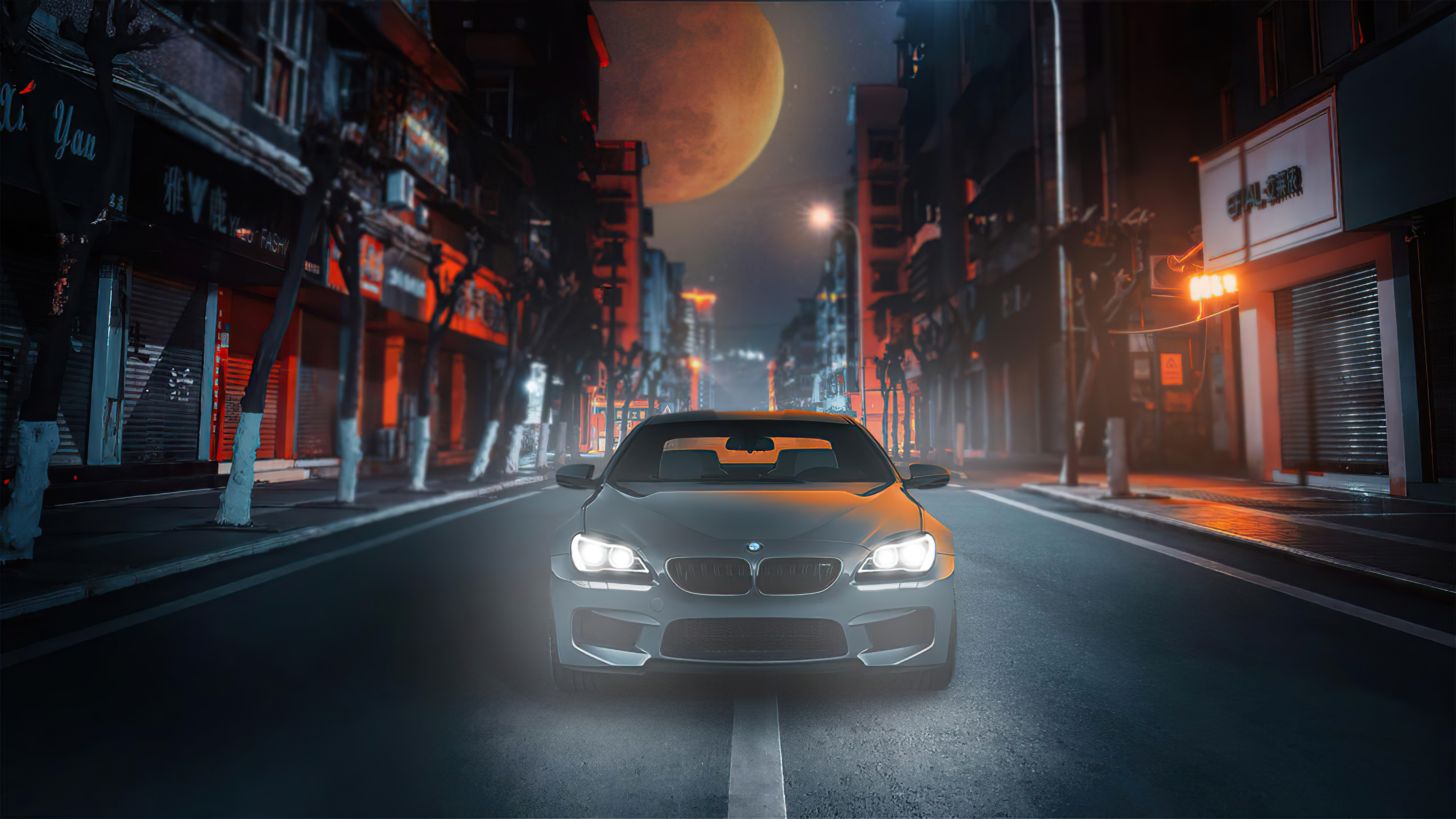 BMW M6 on a city street at night HD Wallpaper