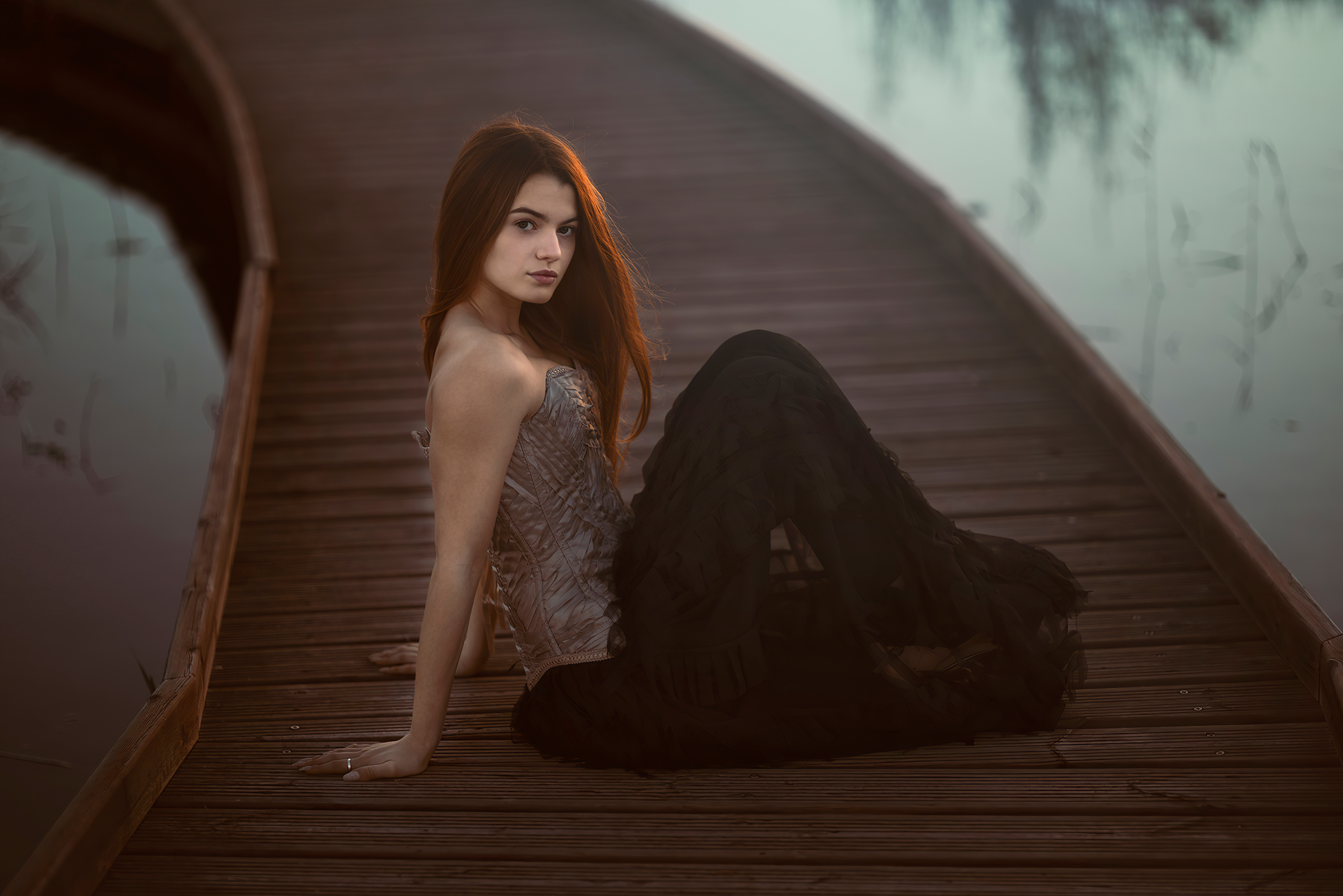 Girl in corset and skirt on wooden pier HD Wallpaper