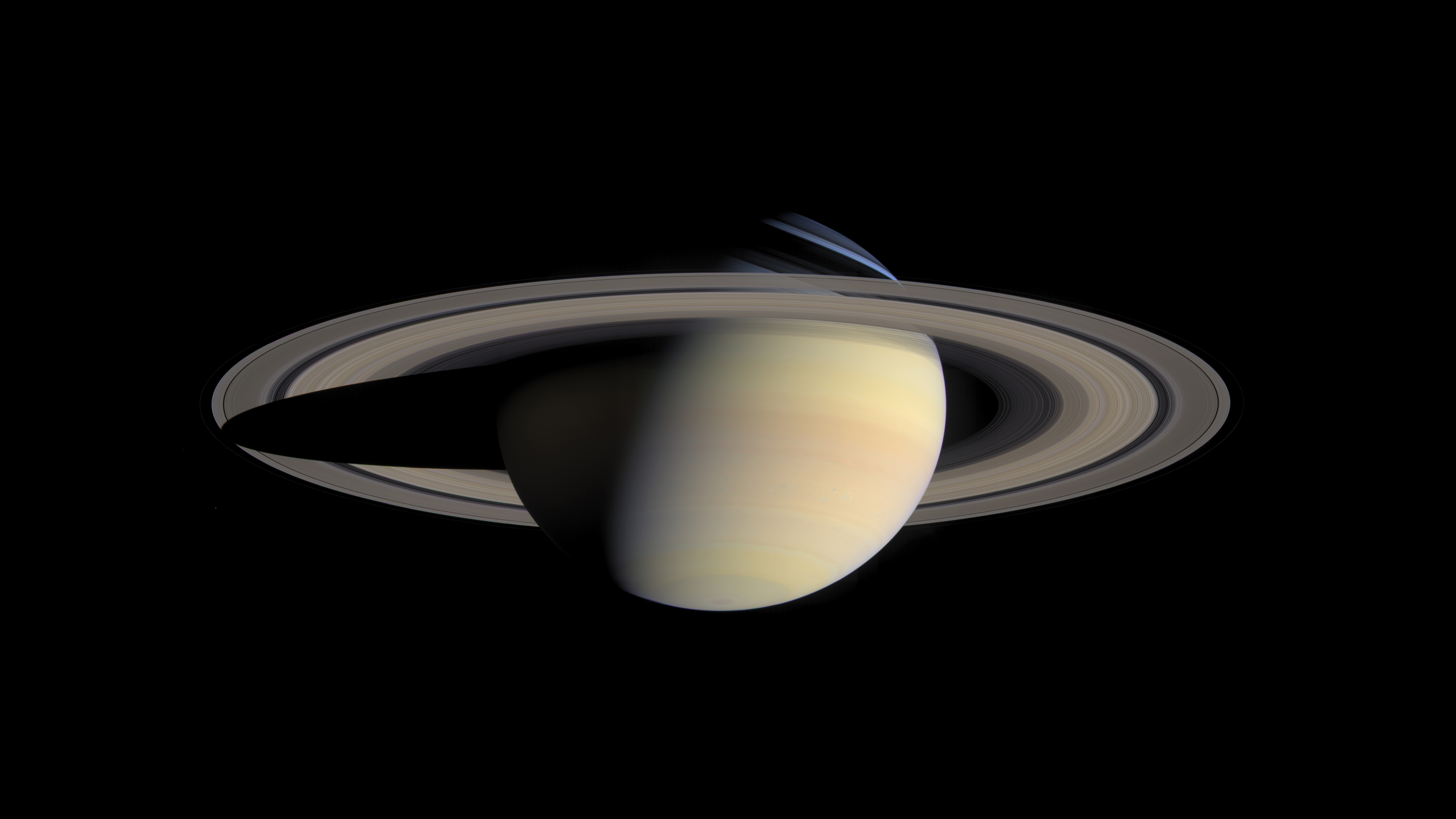 Saturn and its rings in space HD Wallpaper