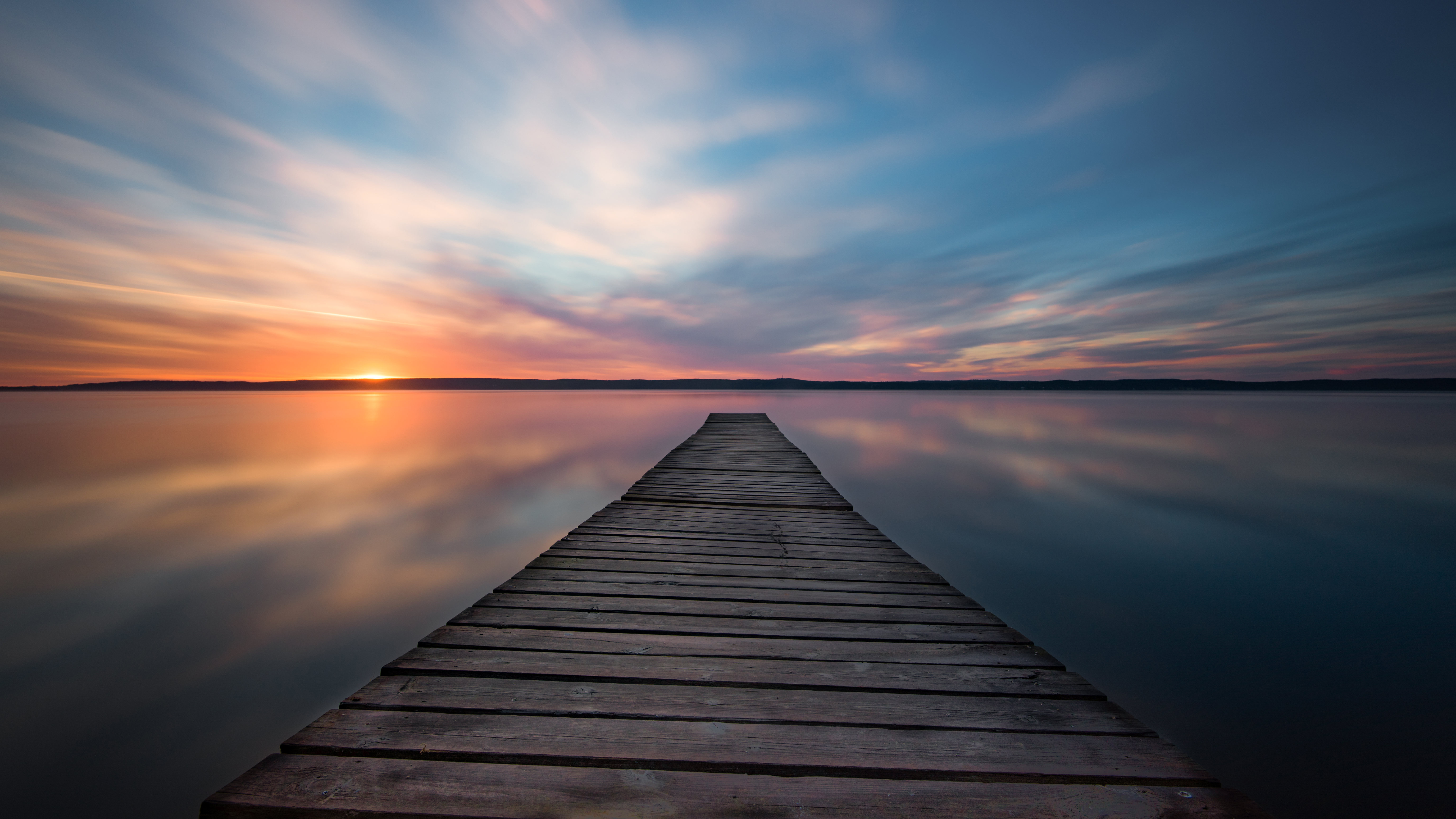 Wooden pier on a lake at sunset HD Wallpaper