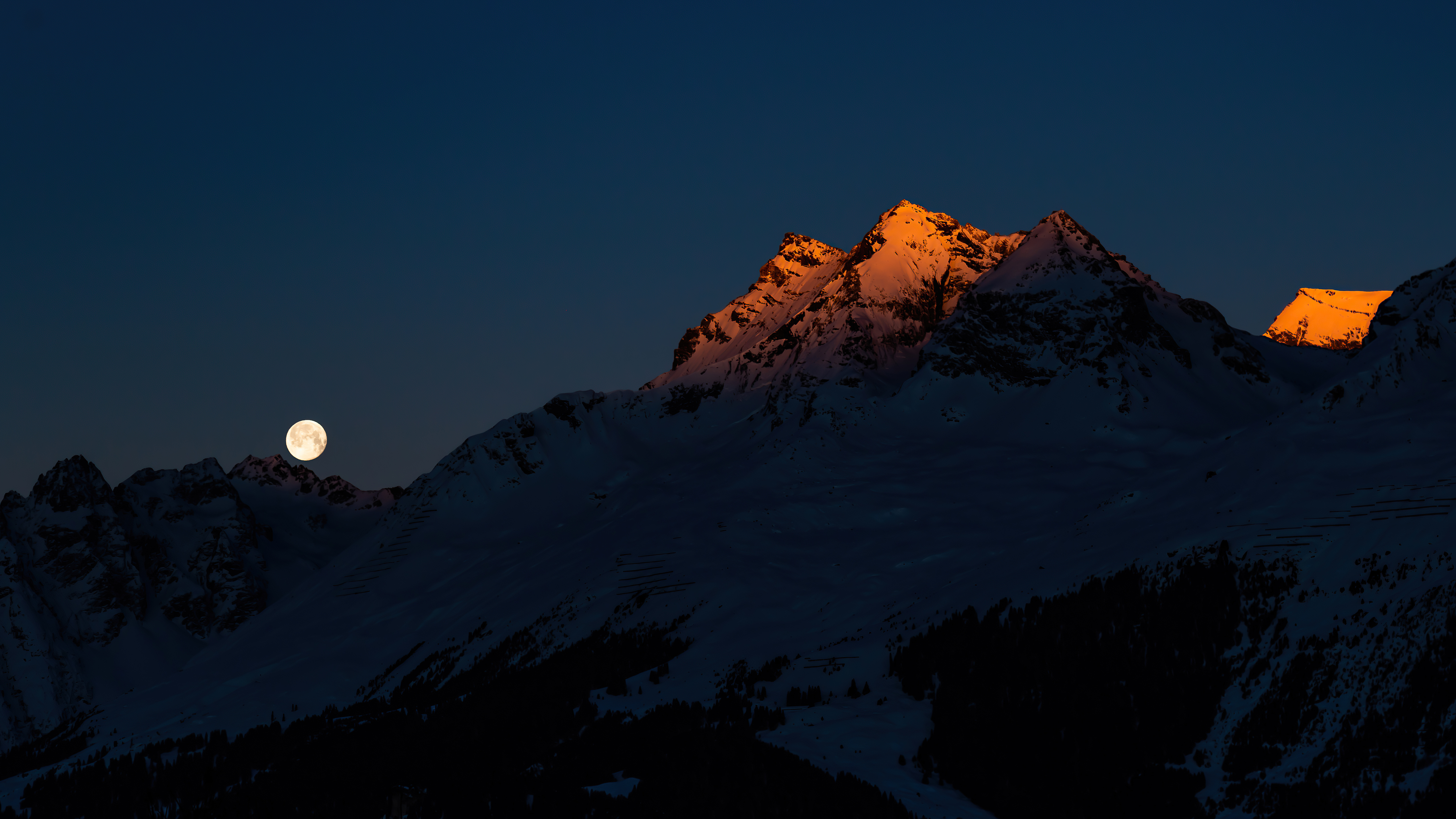 Moon over snow-capped mountains at sunset 4K HD Wallpaper