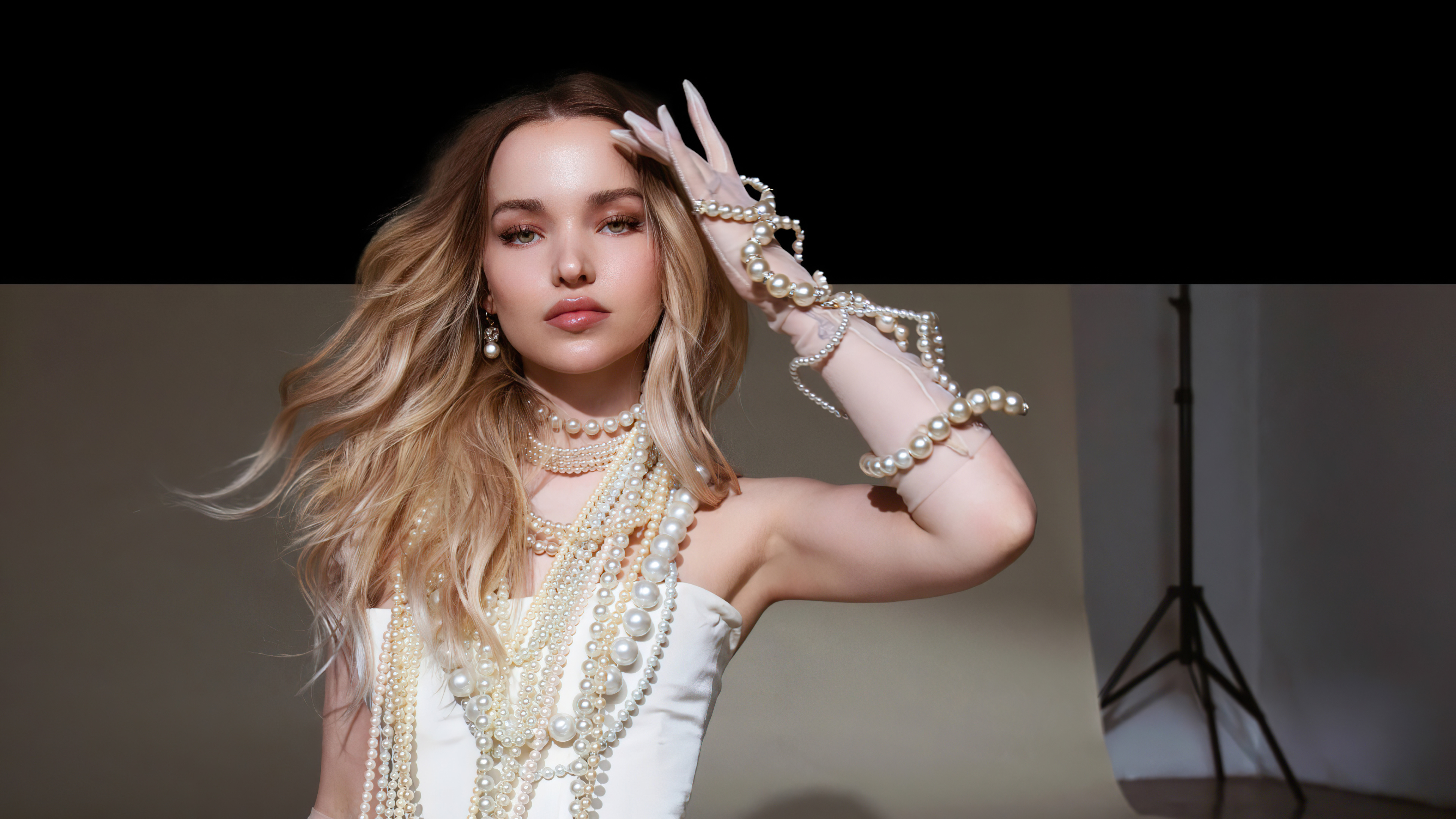 Dove Cameron wearing pearls and gloves HD Wallpaper