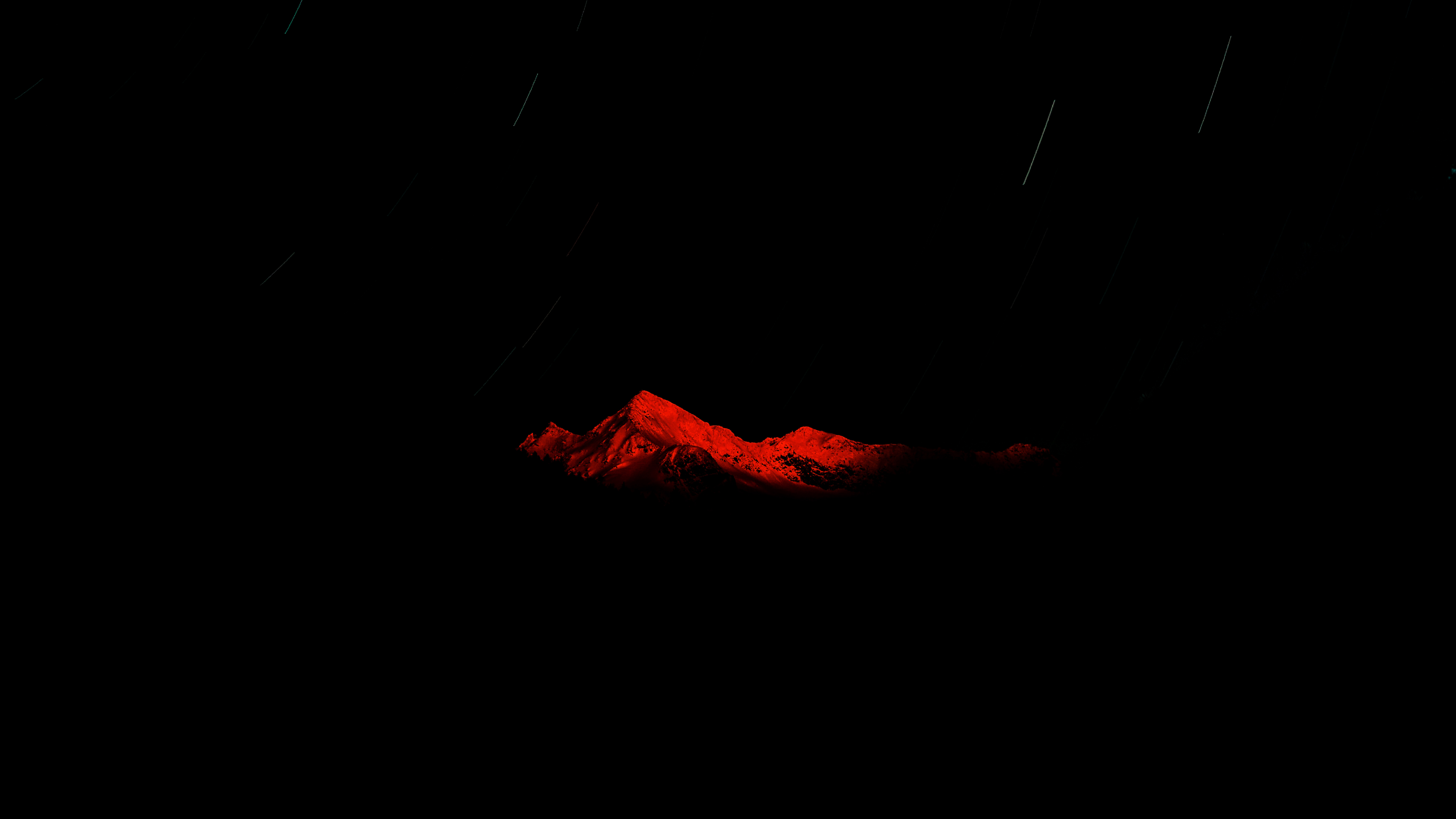 Red mountains in the dark with streaks of light HD Wallpaper