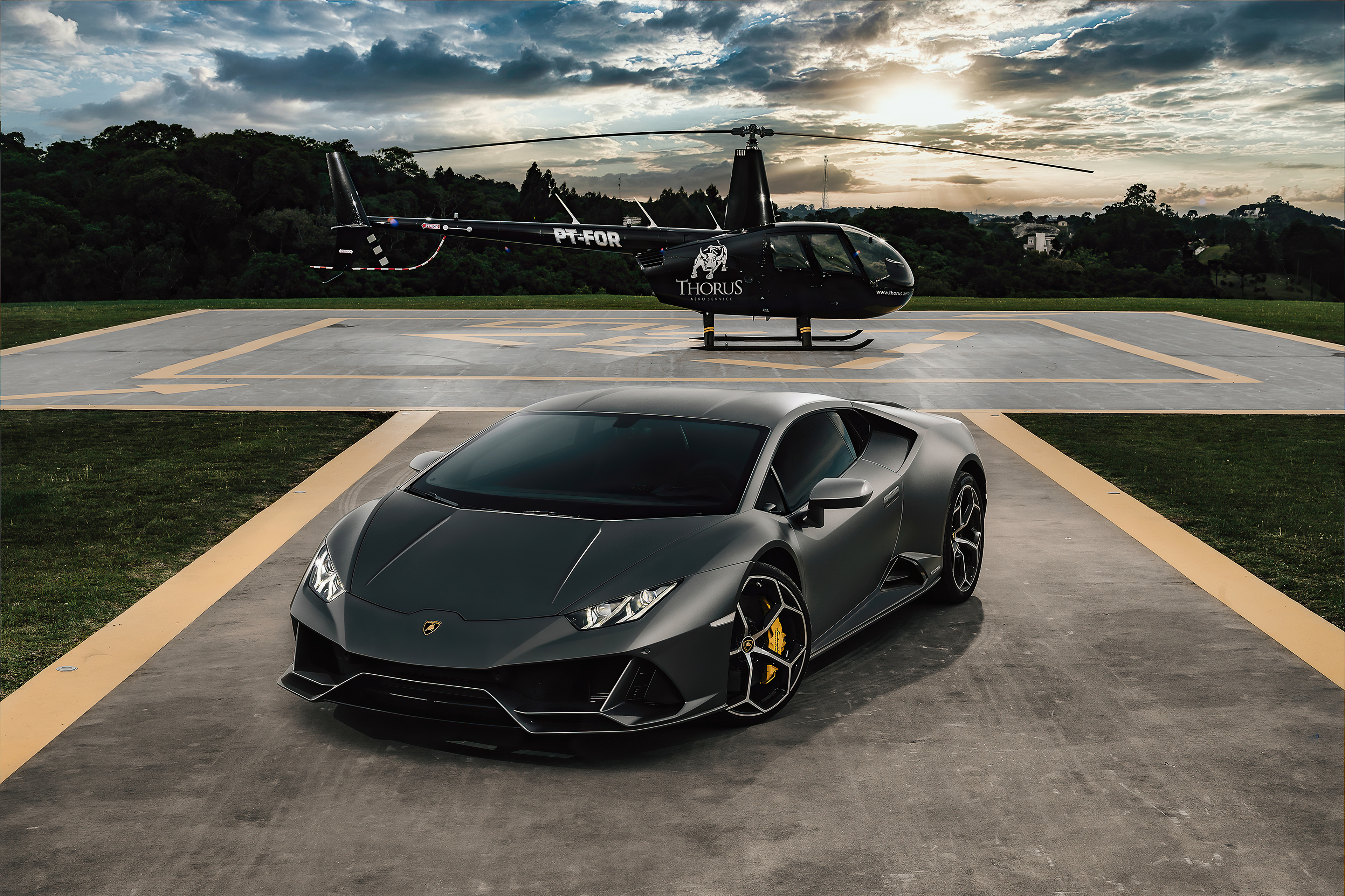 Lamborghini Huracan Evo and Helicopter on Helipad HD Wallpaper