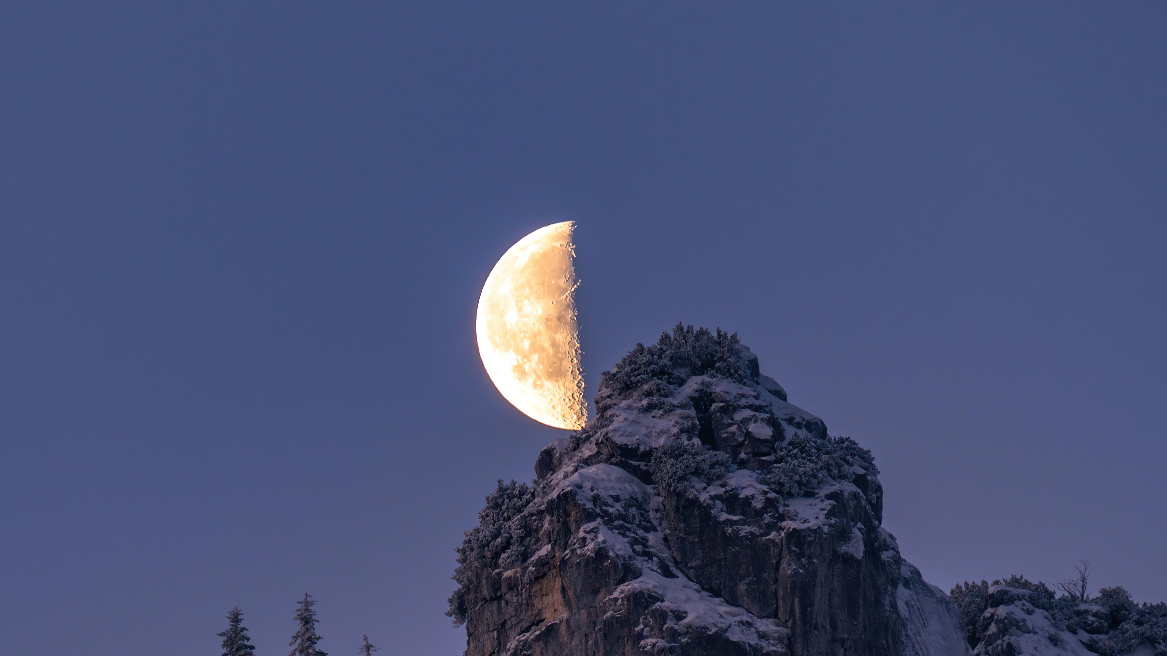 Half moon over snow-covered mountains HD Wallpaper