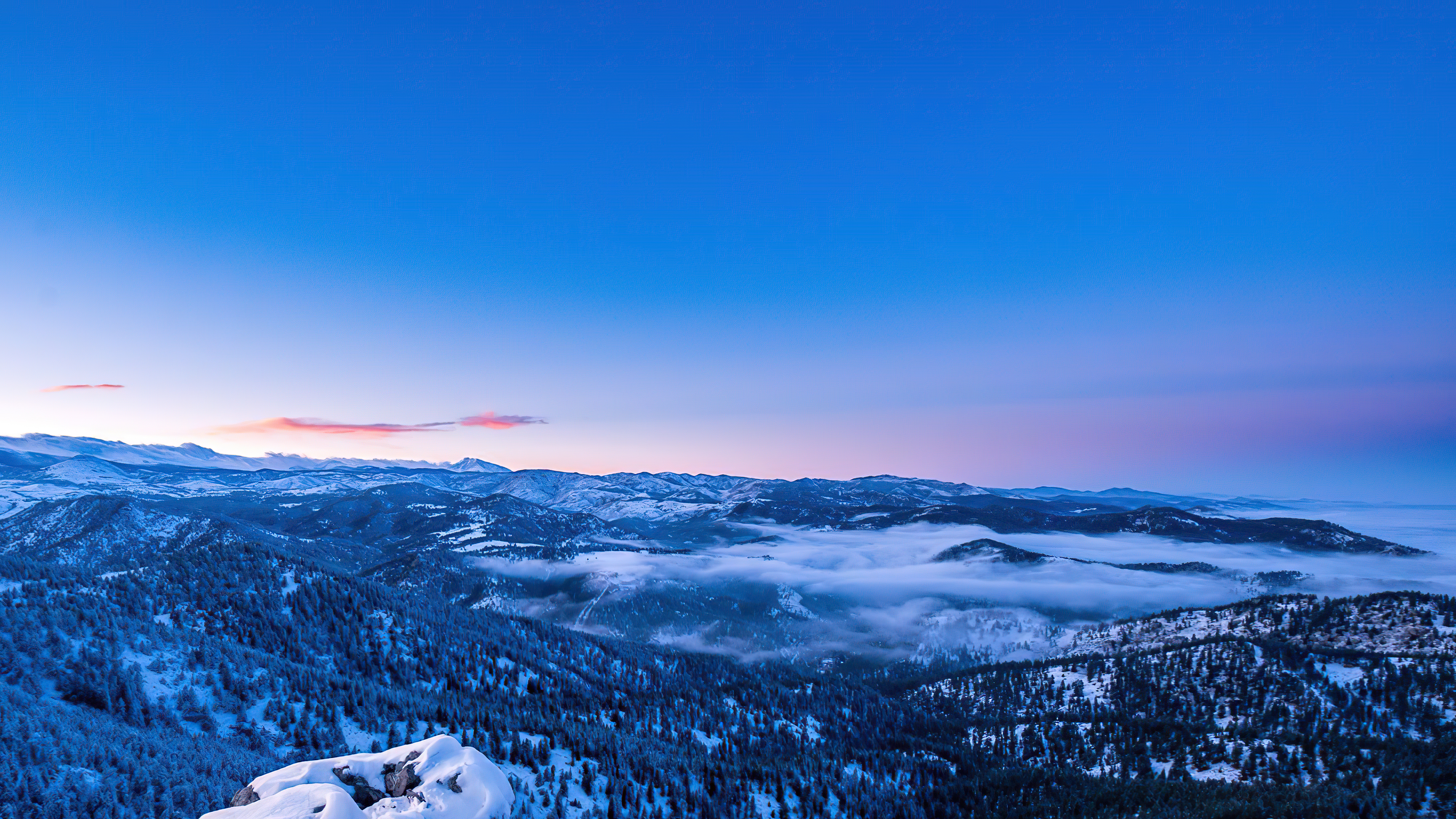 Snowy mountains with fog at sunrise HD Wallpaper