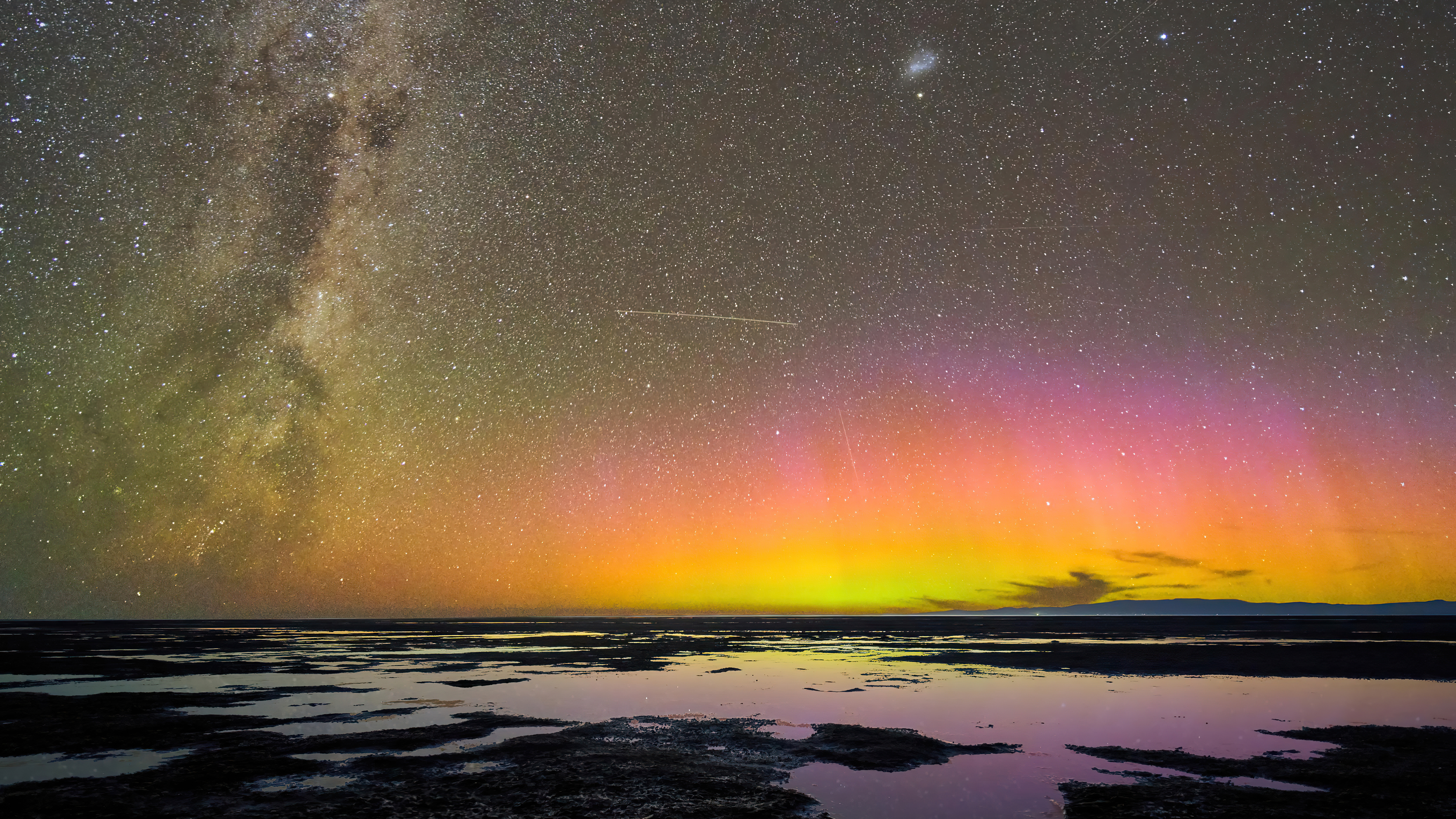 Milky Way and Aurora over water HD Wallpaper