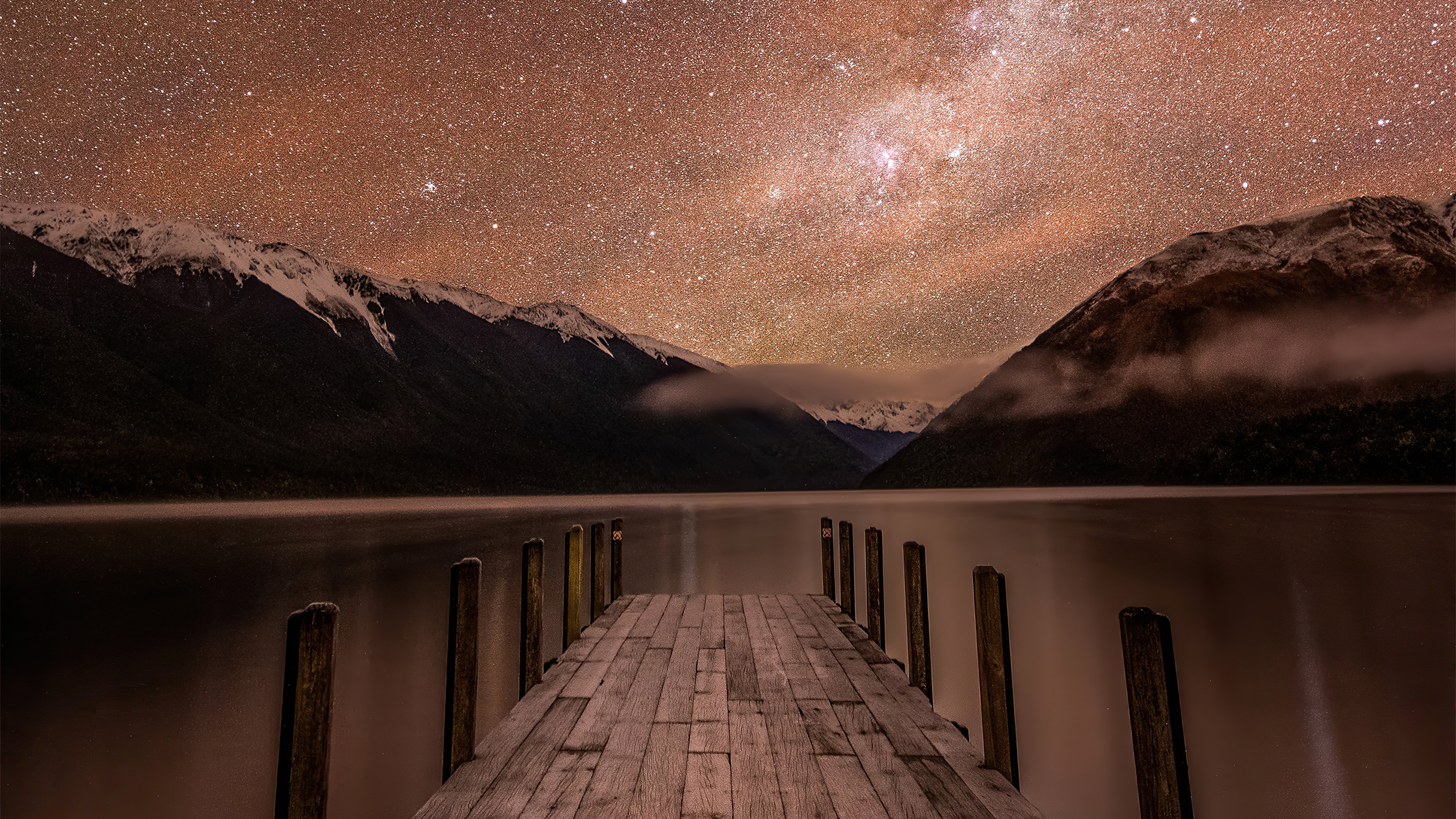Wooden dock under starry sky and mountains 4K HD Wallpaper
