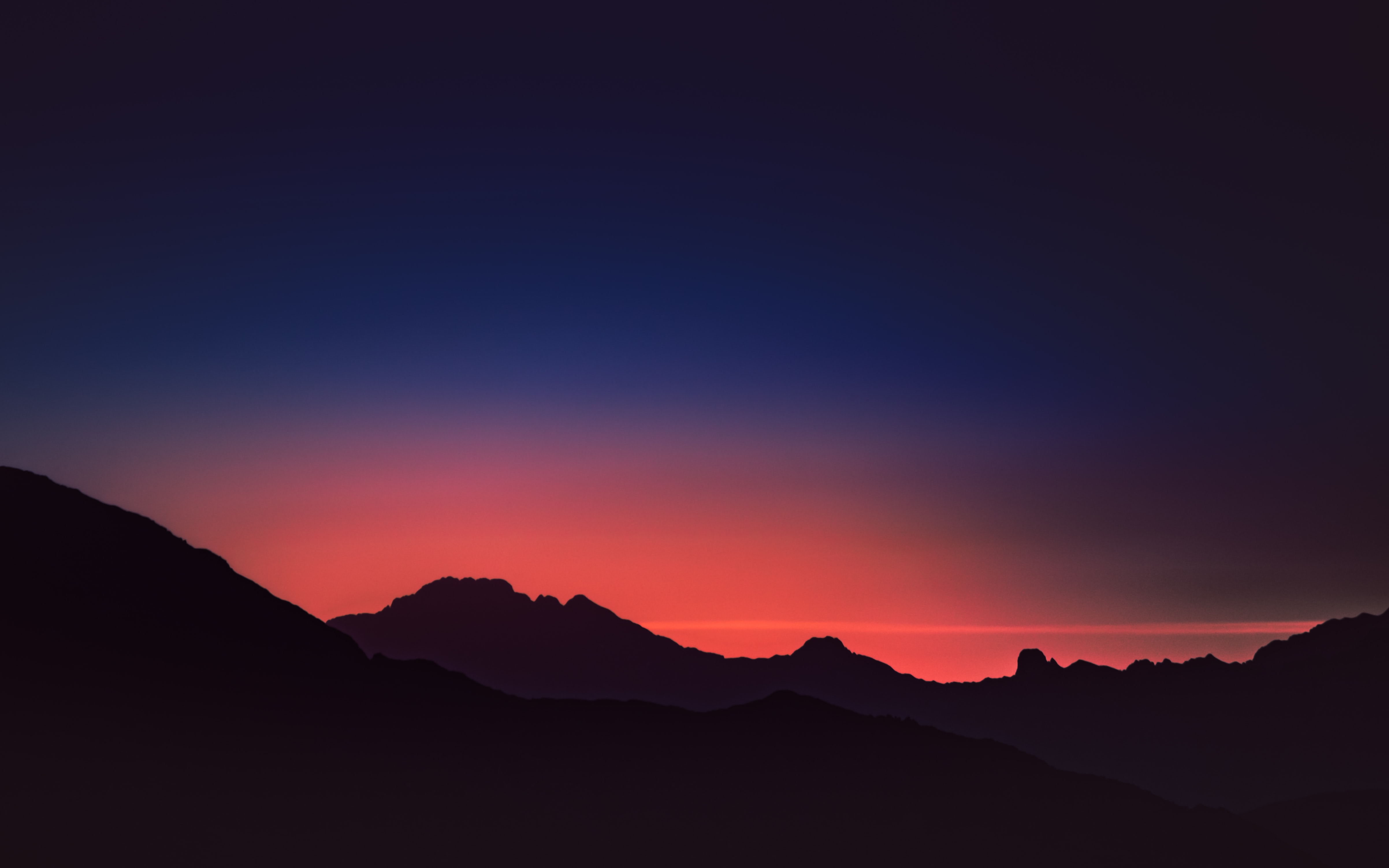 Silhouette of mountains during sunset HD Wallpaper
