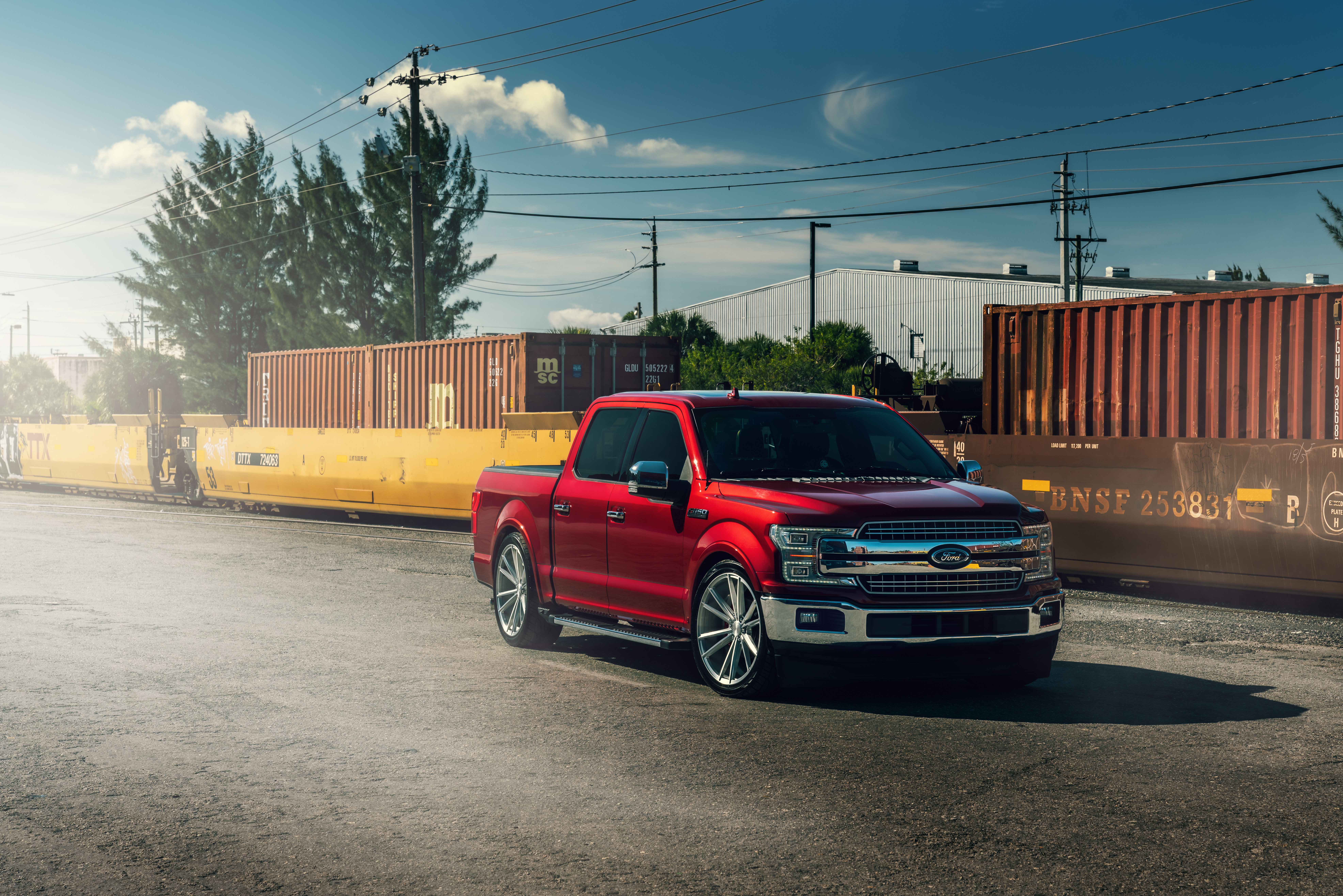 Red Ford F-150 Truck near Shipping Containers HD Wallpaper