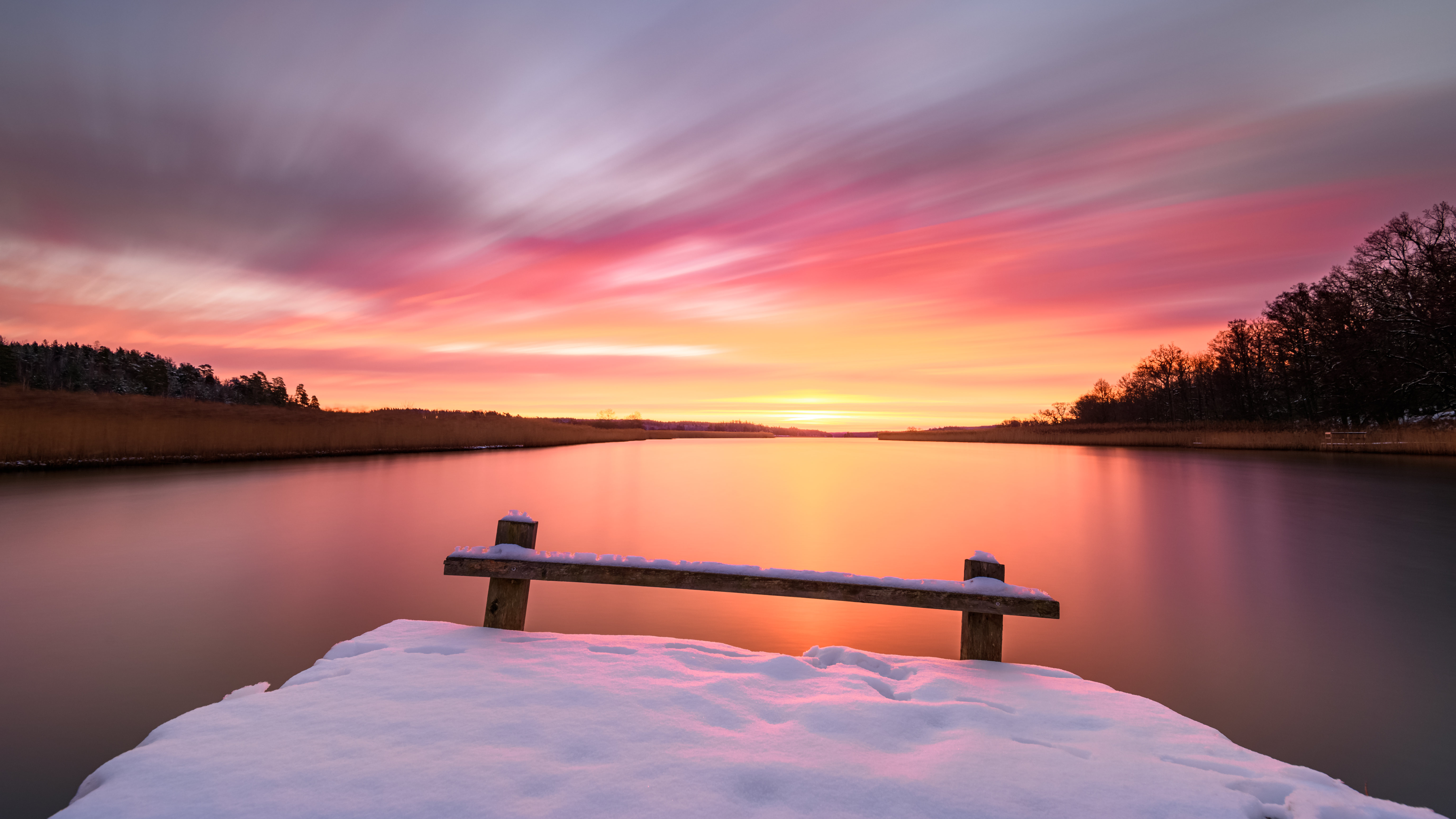 Winter sunrise over a snowy lake with a wooden pier HD Wallpaper