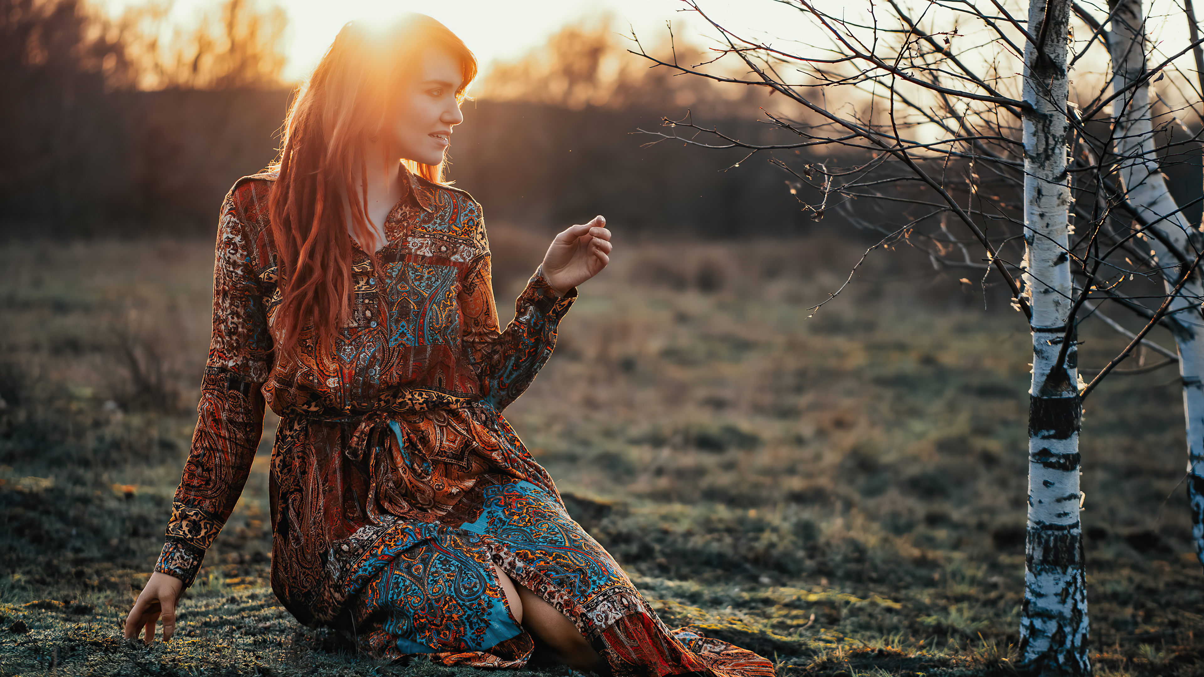 Redhead girl in a patterned dress in a field HD Wallpaper