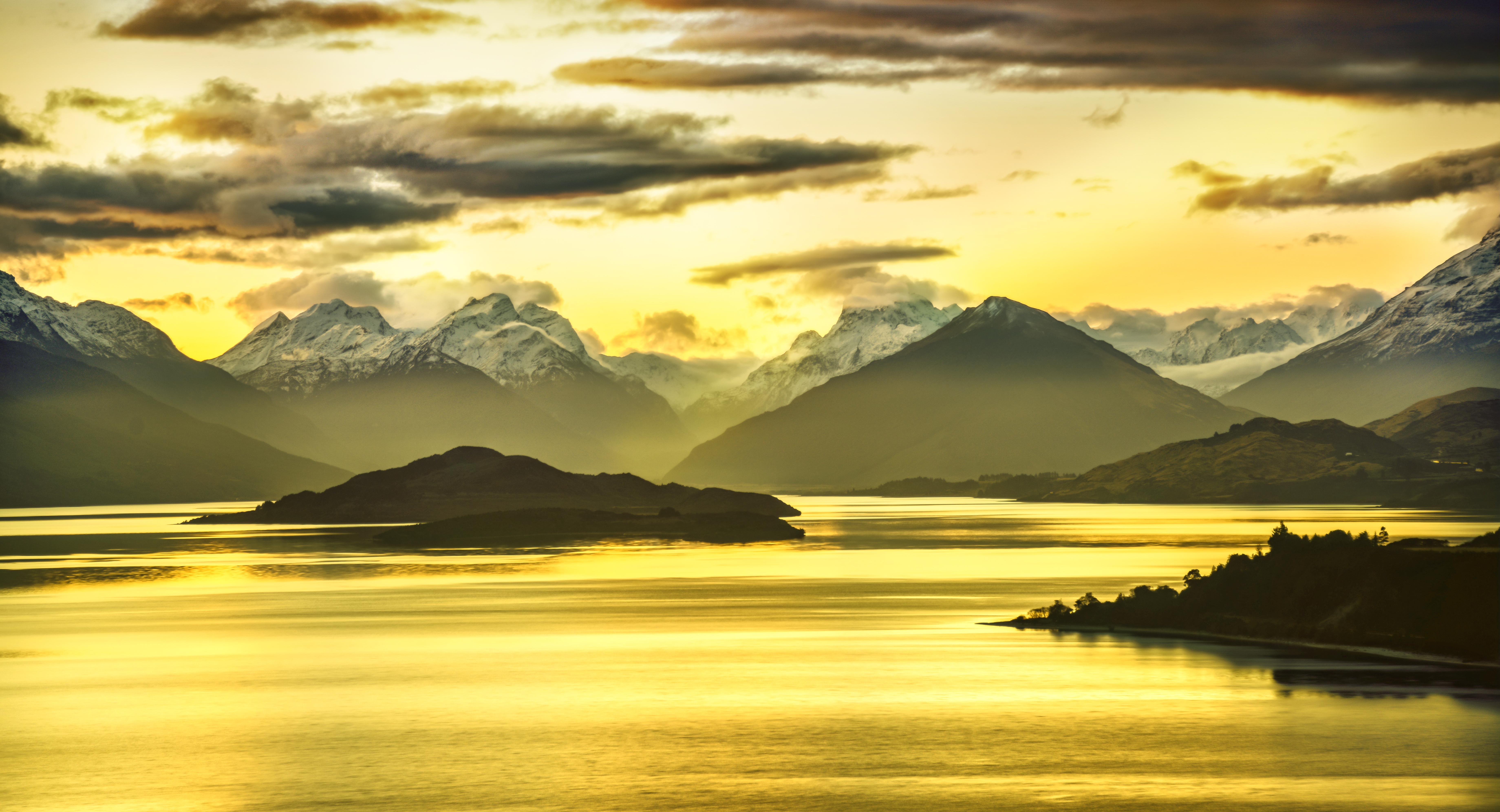 Golden sunset over mountains and lake HD Wallpaper