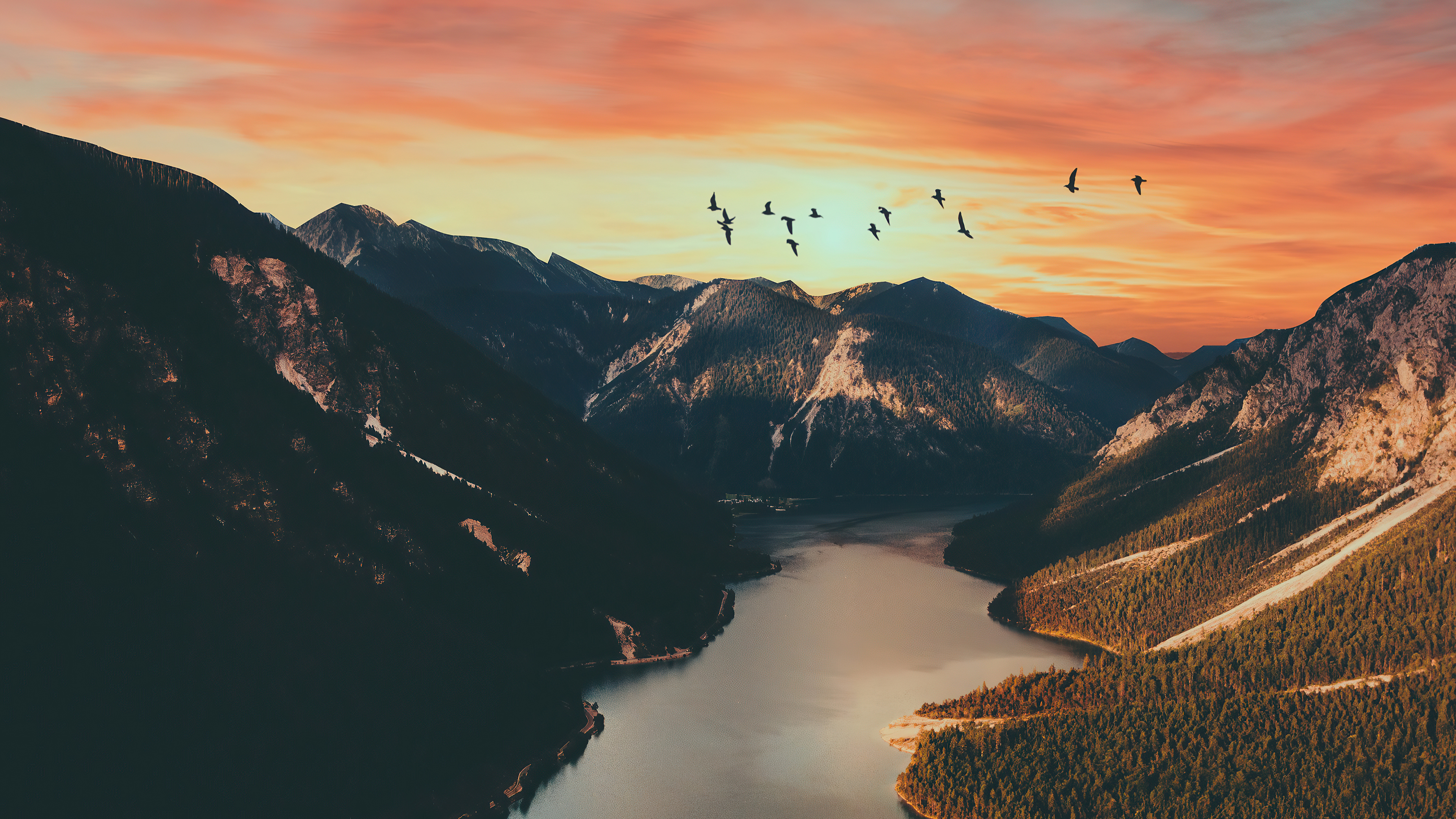 Birds flying over mountains and lake at sunset 4K HD Wallpaper
