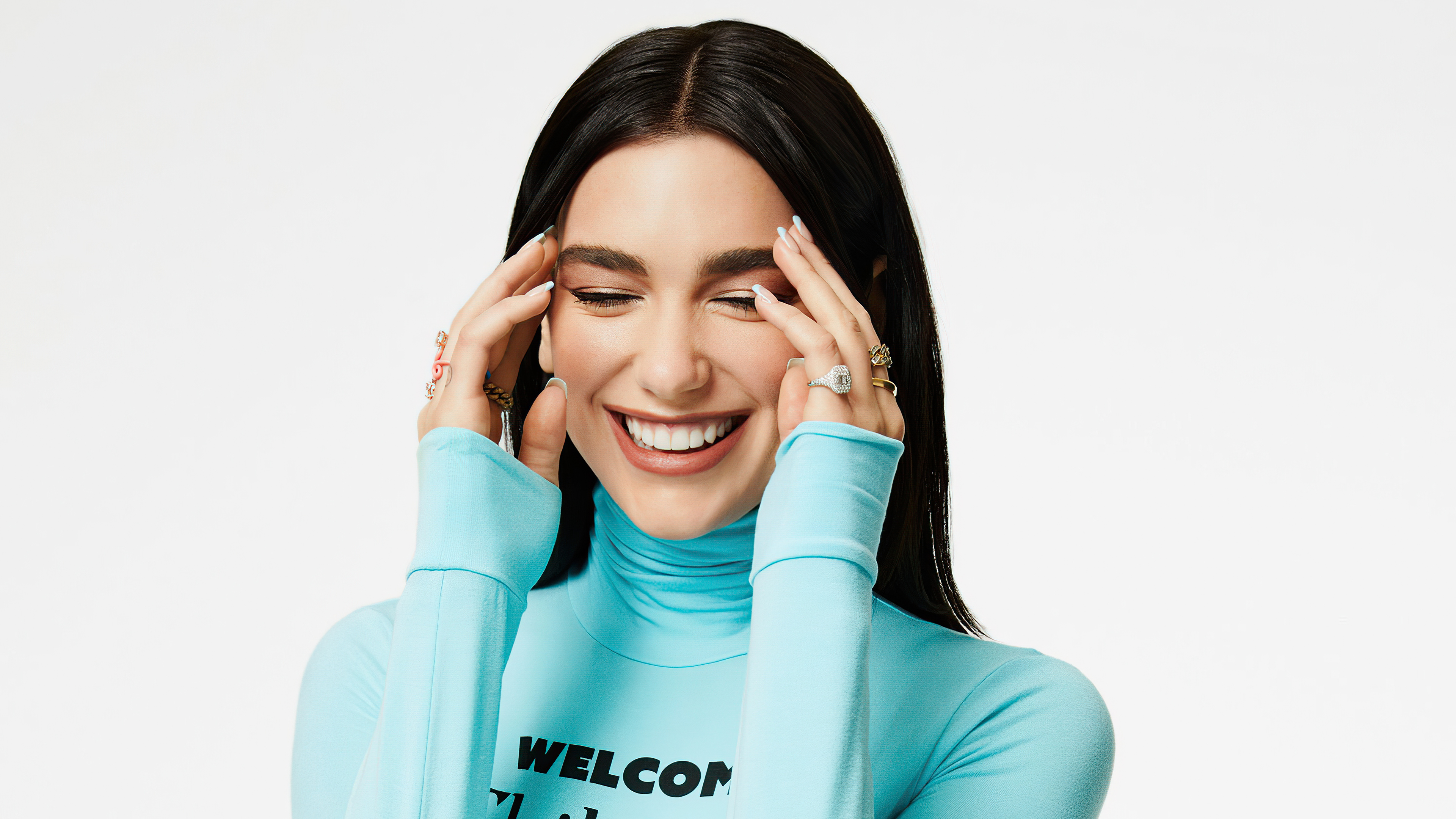 Dua Lipa smiling with hands on her head HD Wallpaper