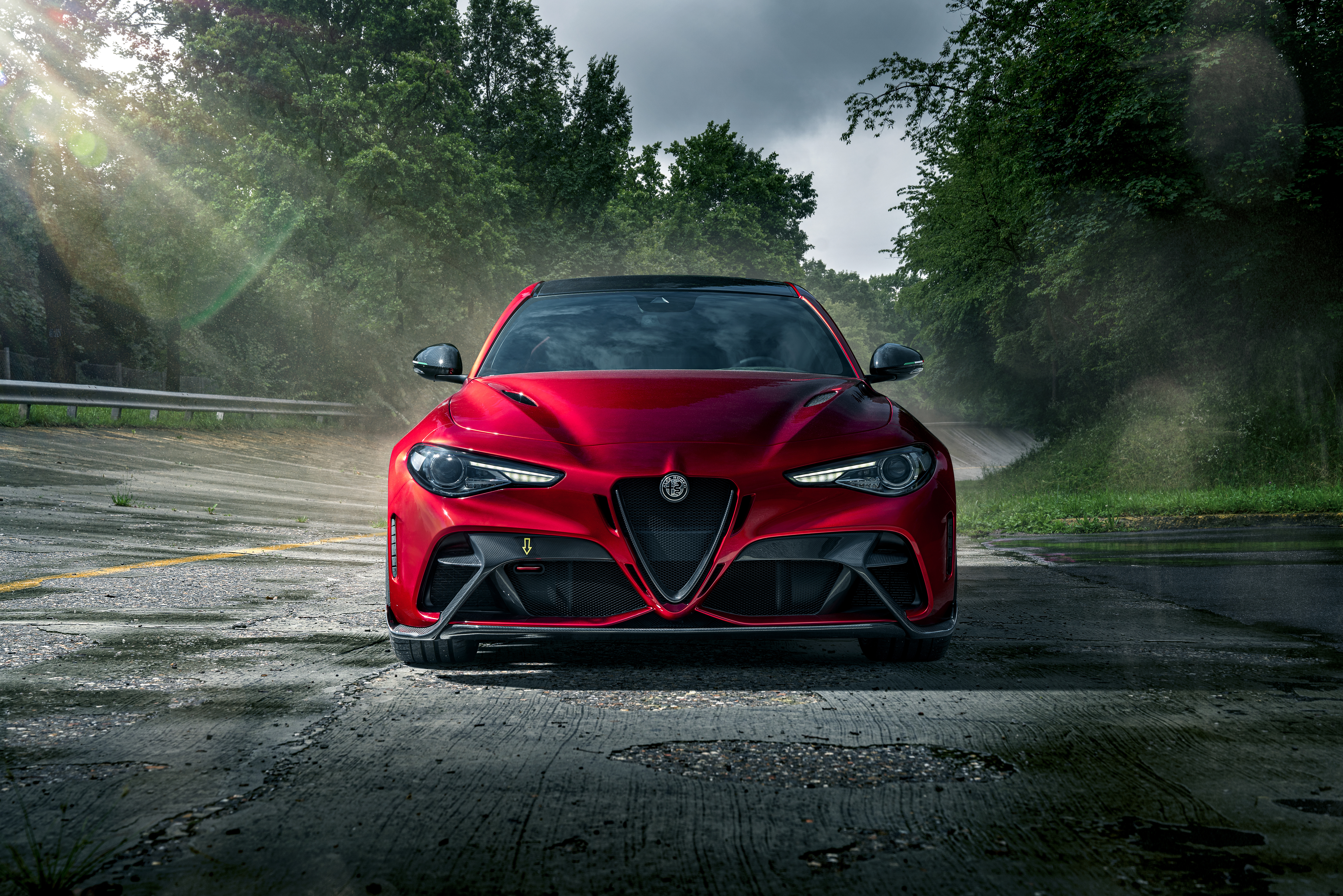 Red Alfa Romeo Giulia Quadrifoglio on a Wet Road HD Wallpaper