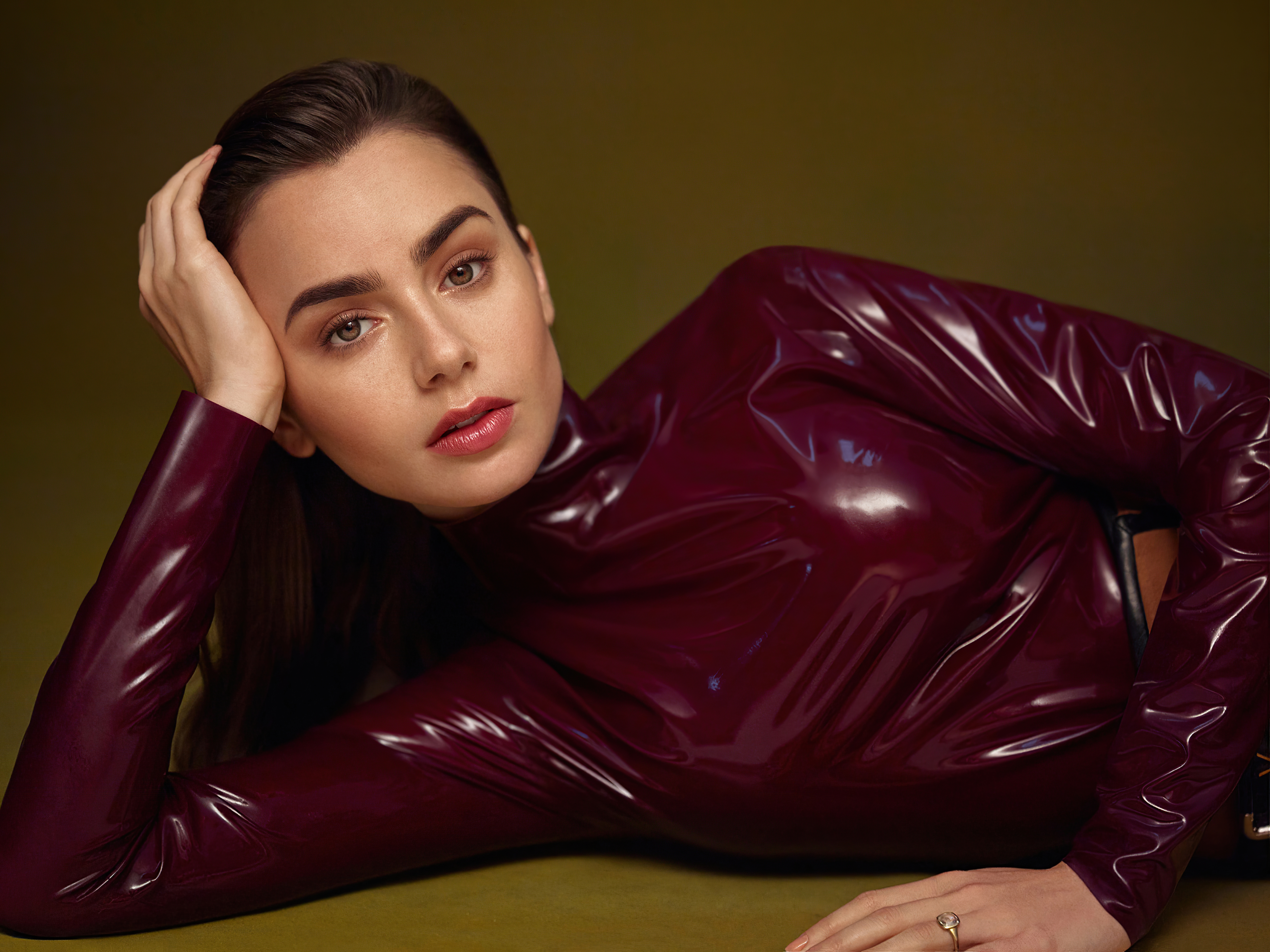 Lily Collins in a burgundy latex top HD Wallpaper