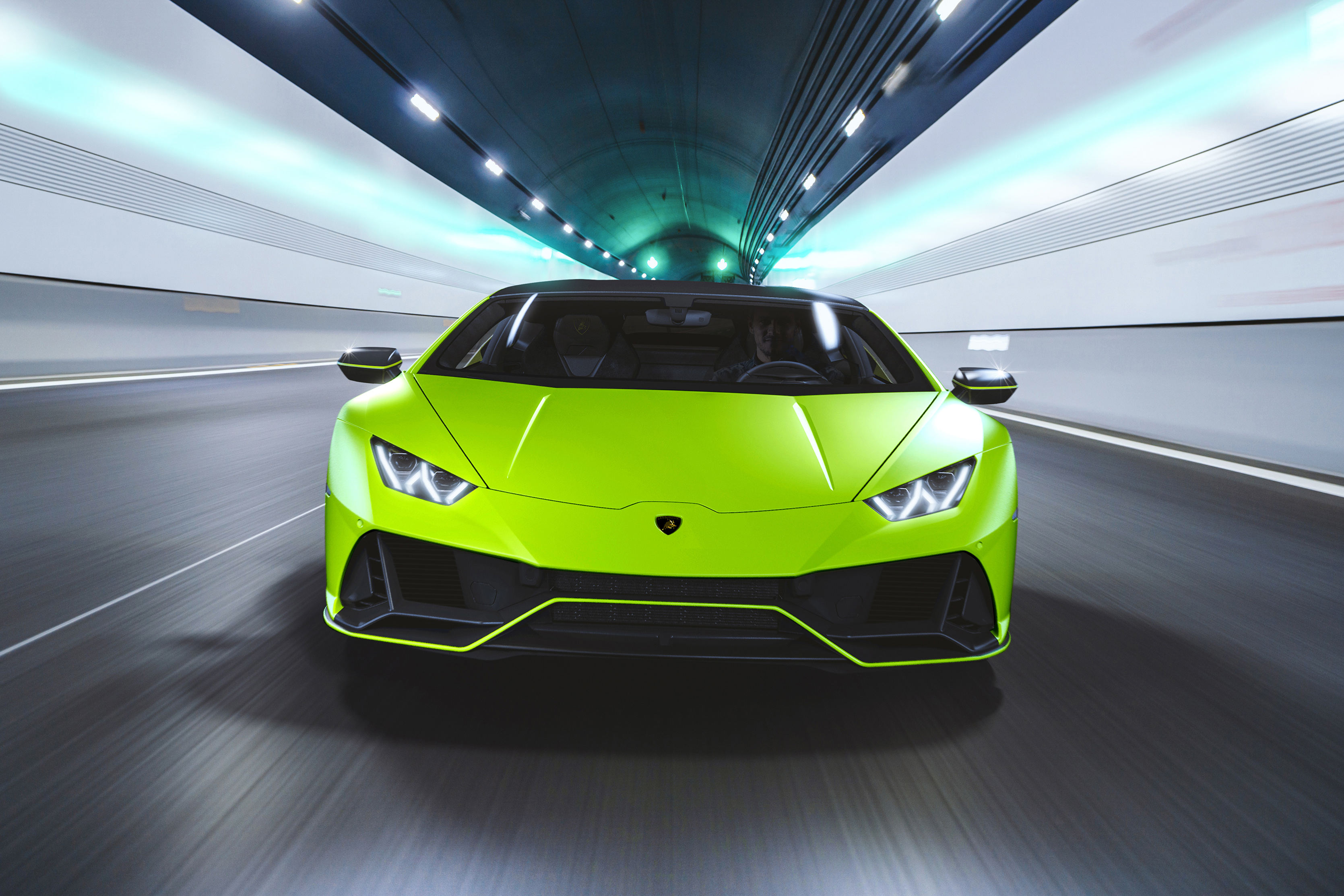 Lamborghini Huracan Evo driving through a tunnel HD Wallpaper