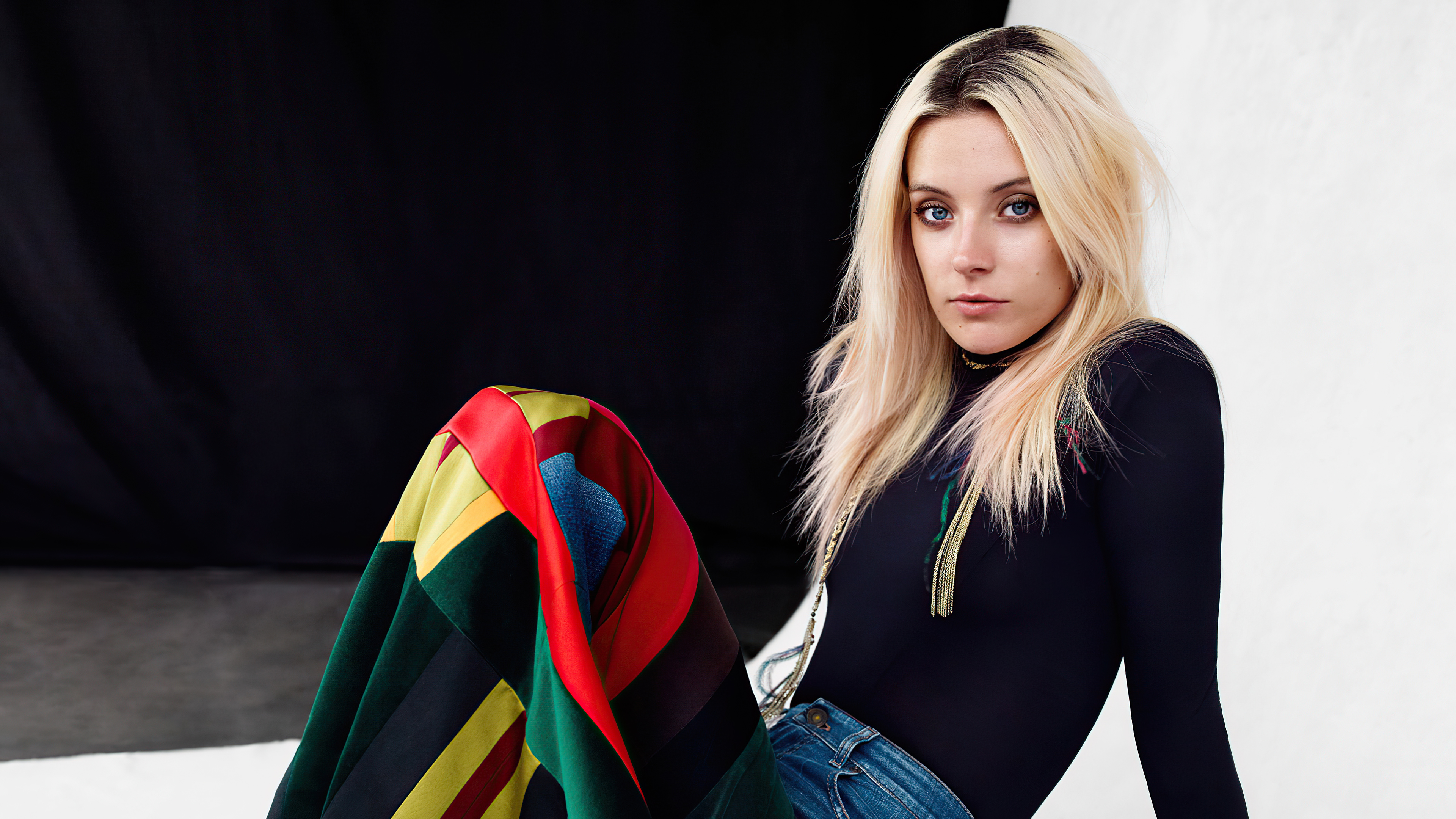 Model with blonde hair wearing colorful pants HD Wallpaper