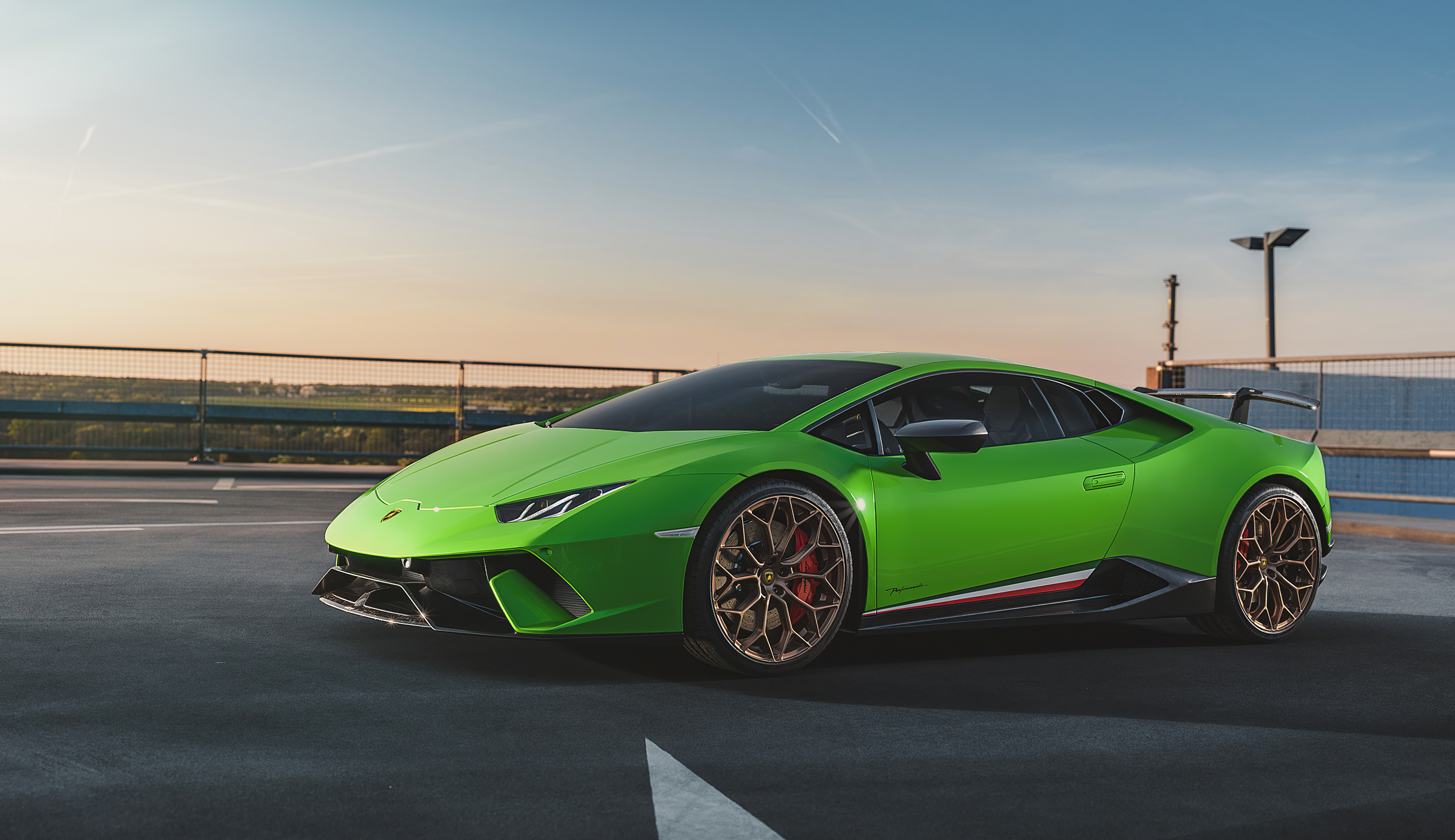 Green Lamborghini Huracan Performante on rooftop HD Wallpaper