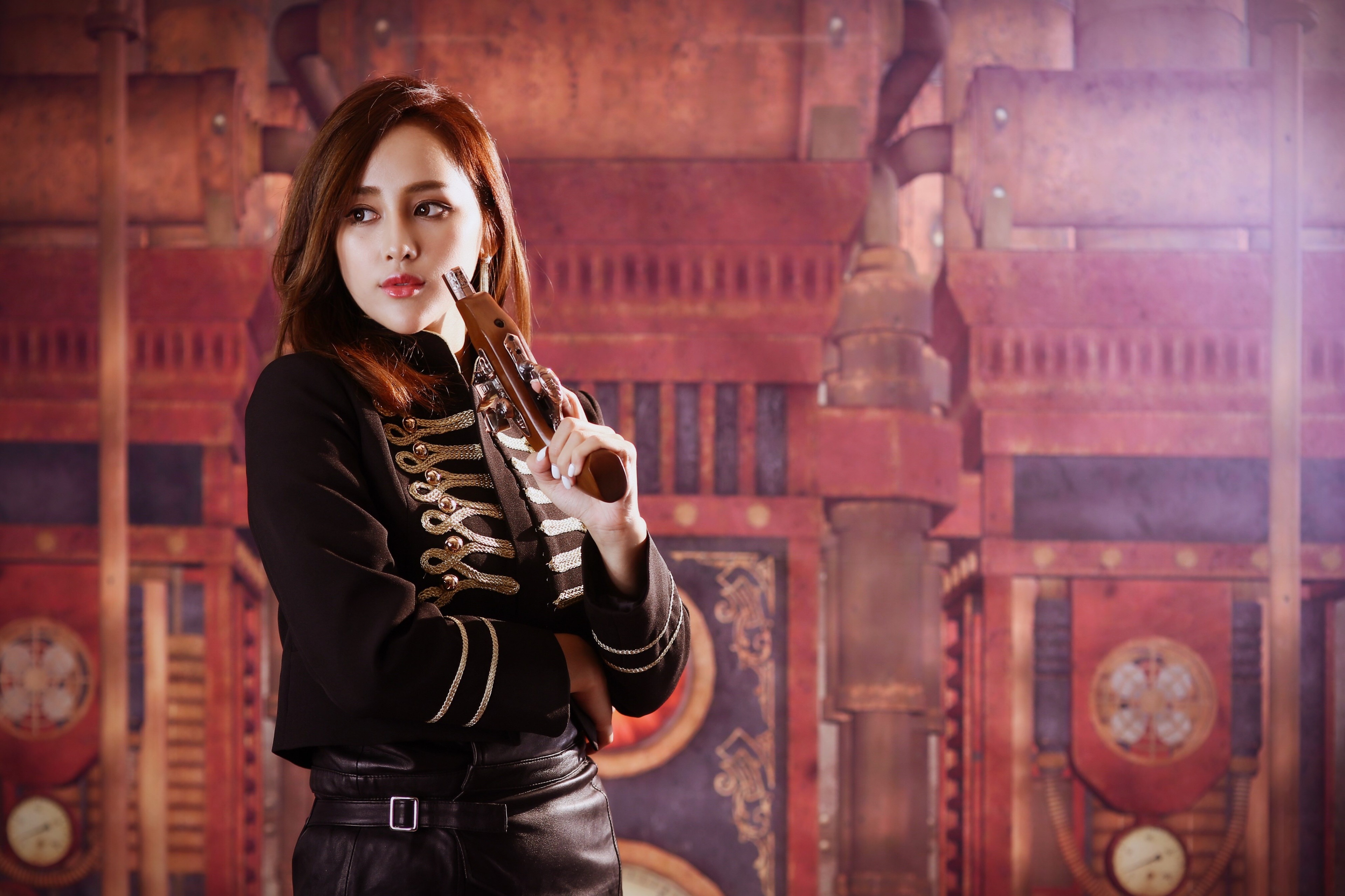 Woman in Steampunk Outfit Holding a Pistol HD Wallpaper