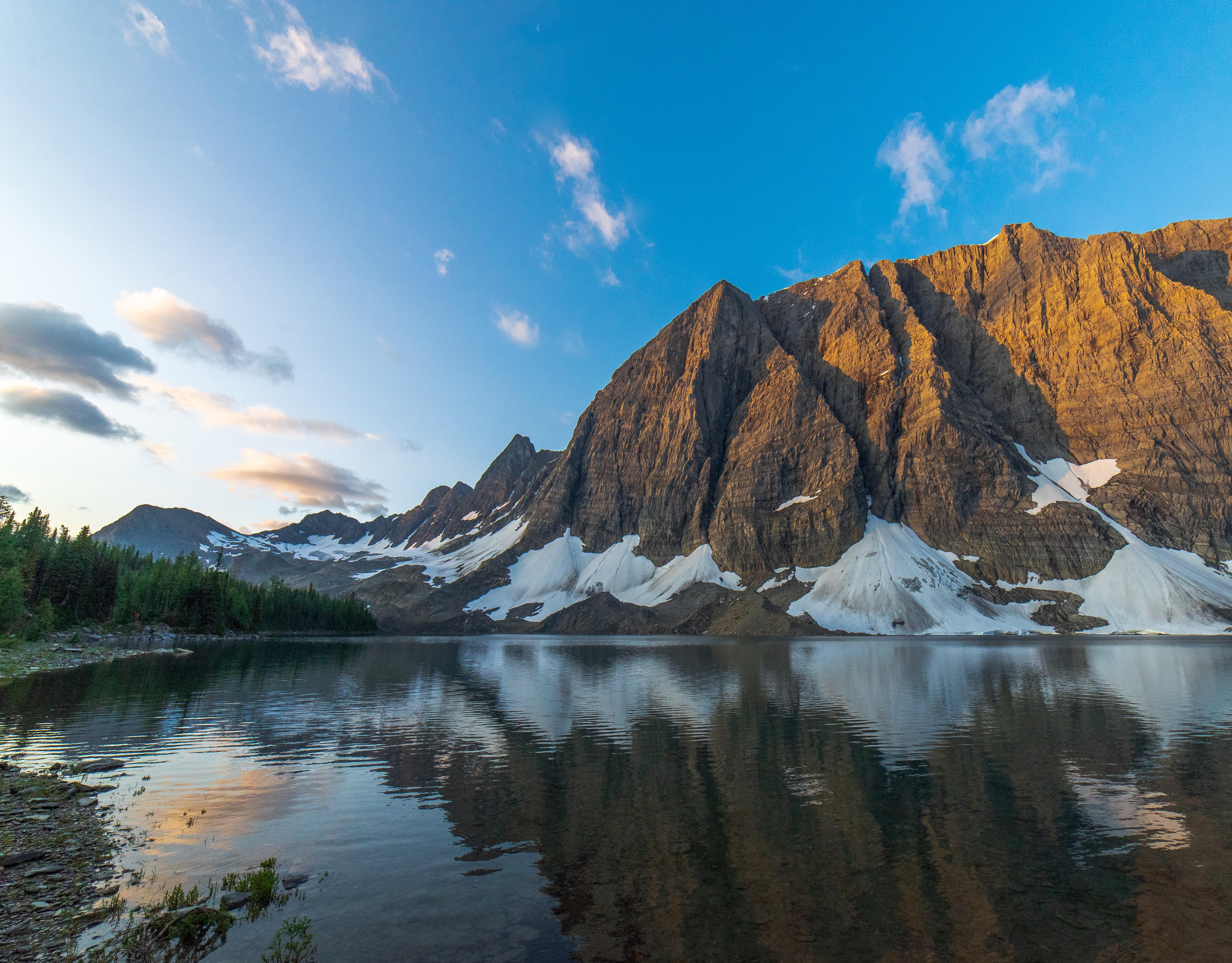 Mountain Lake at Sunset with Snow Patches HD Wallpaper