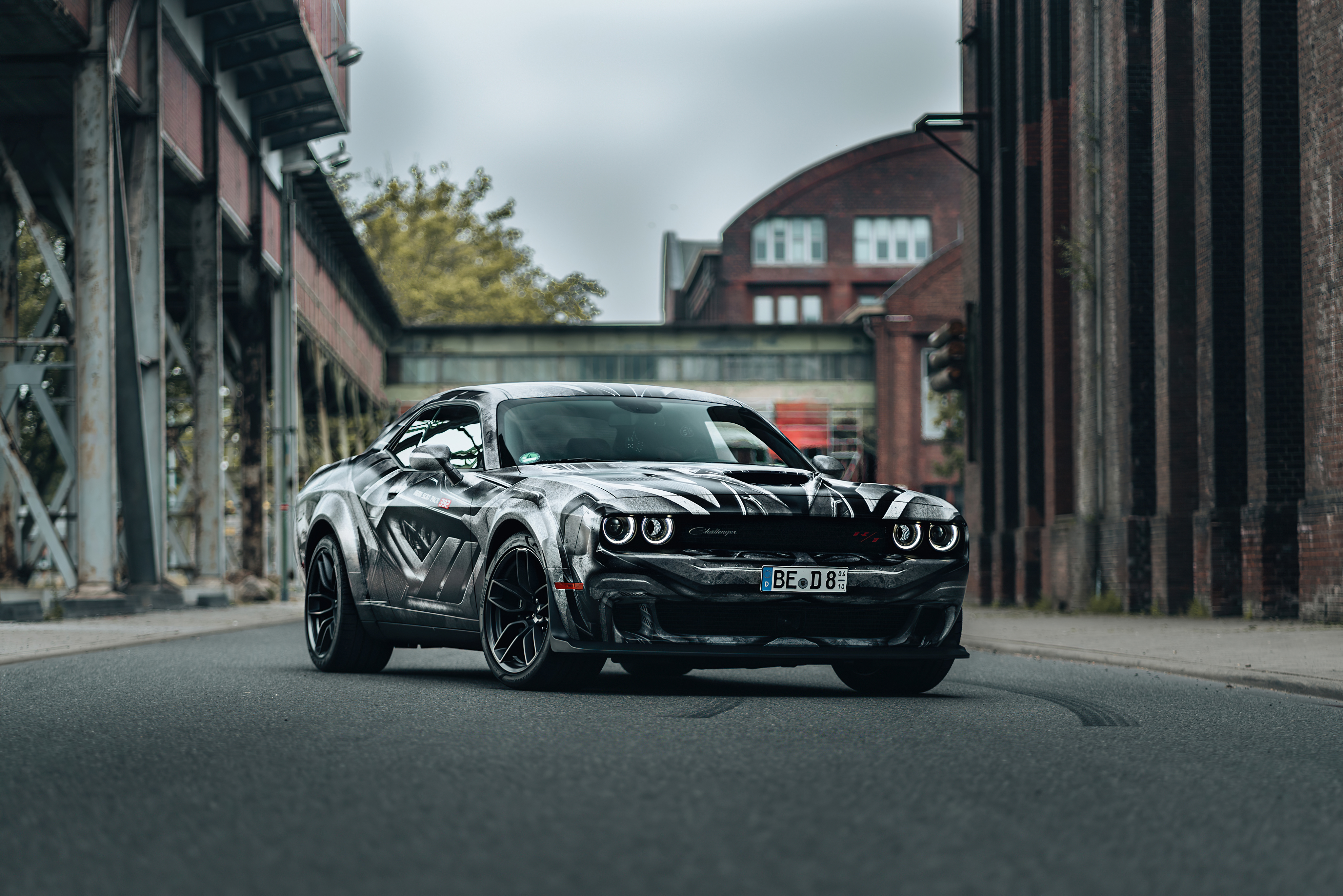Dodge Challenger with custom graphics in industrial setting HD Wallpaper